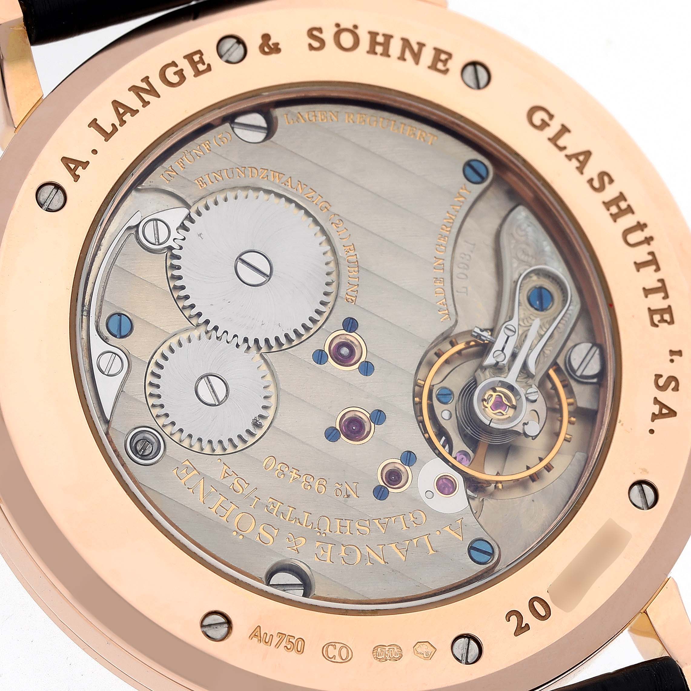 This image shows the back view of an A. Lange 
Sohne Saxonia 211.032 Men
s Rose Gold Silver Dial watch, detailing its intricate mechanical movement.