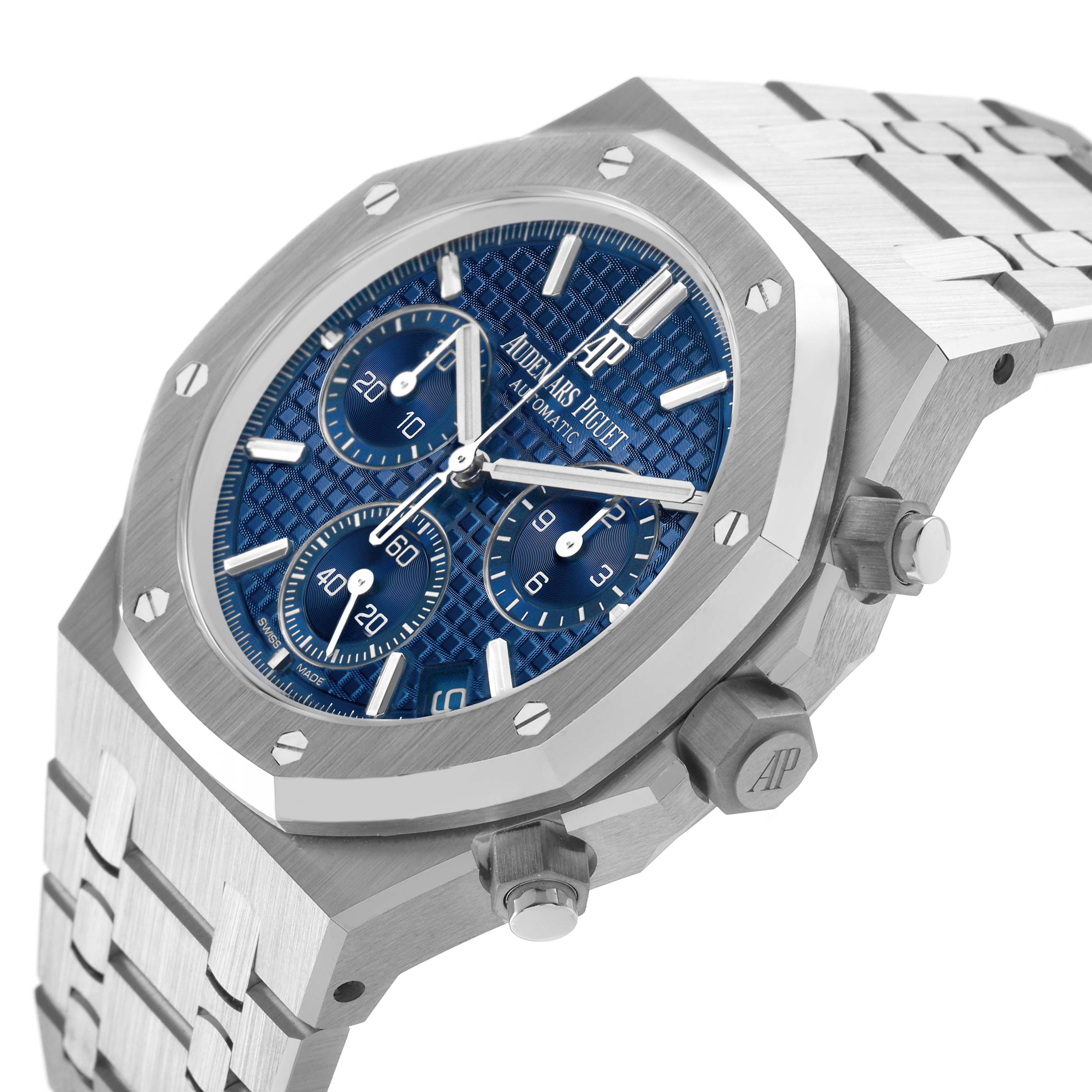 The image shows a Royal Oak by Audemars Piguet at a slight angle, highlighting the blue dial, bezel, crown, and part of the bracelet.