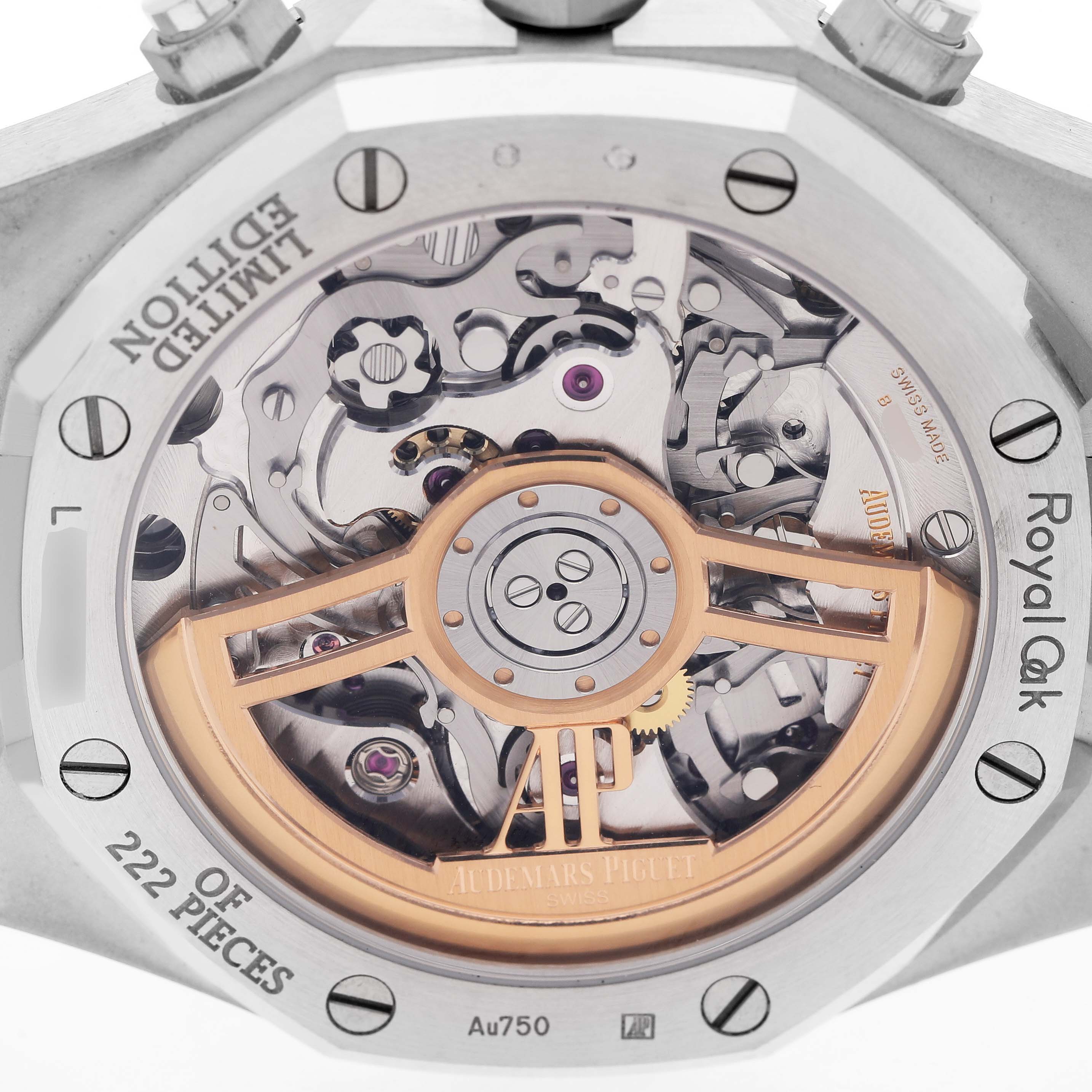 The image shows the back view of an Audemars Piguet Royal Oak 26239BC.OO.1220BC.01 Men's White Gold Blue Dial watch, highlighting the intricate movement and rotor.