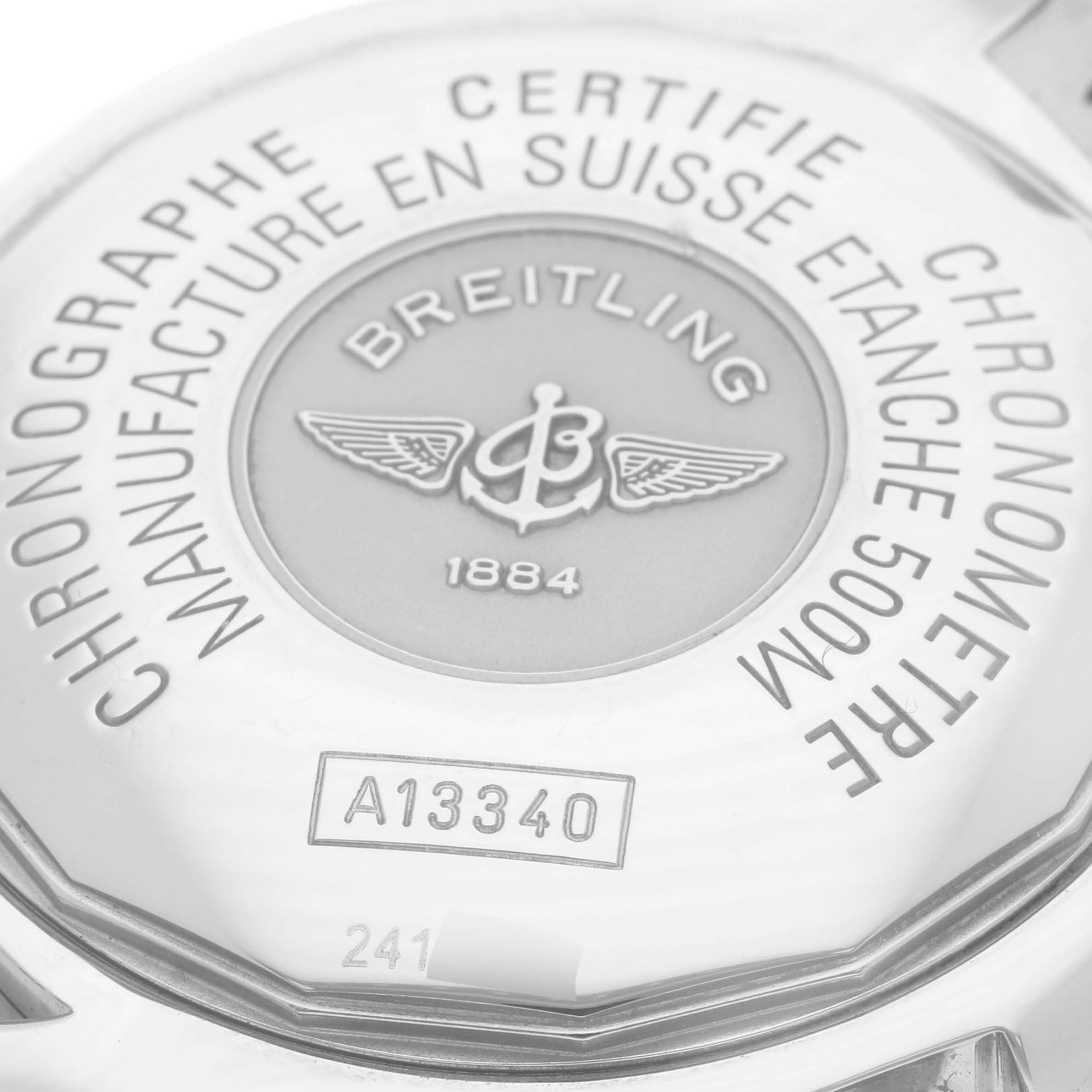 The image shows the back of a Breitling Superocean A13340 Men's Stainless Steel Beige Dial A13340 Men's Stainless Steel Beige Dial watch, detailing the engravings and branding.