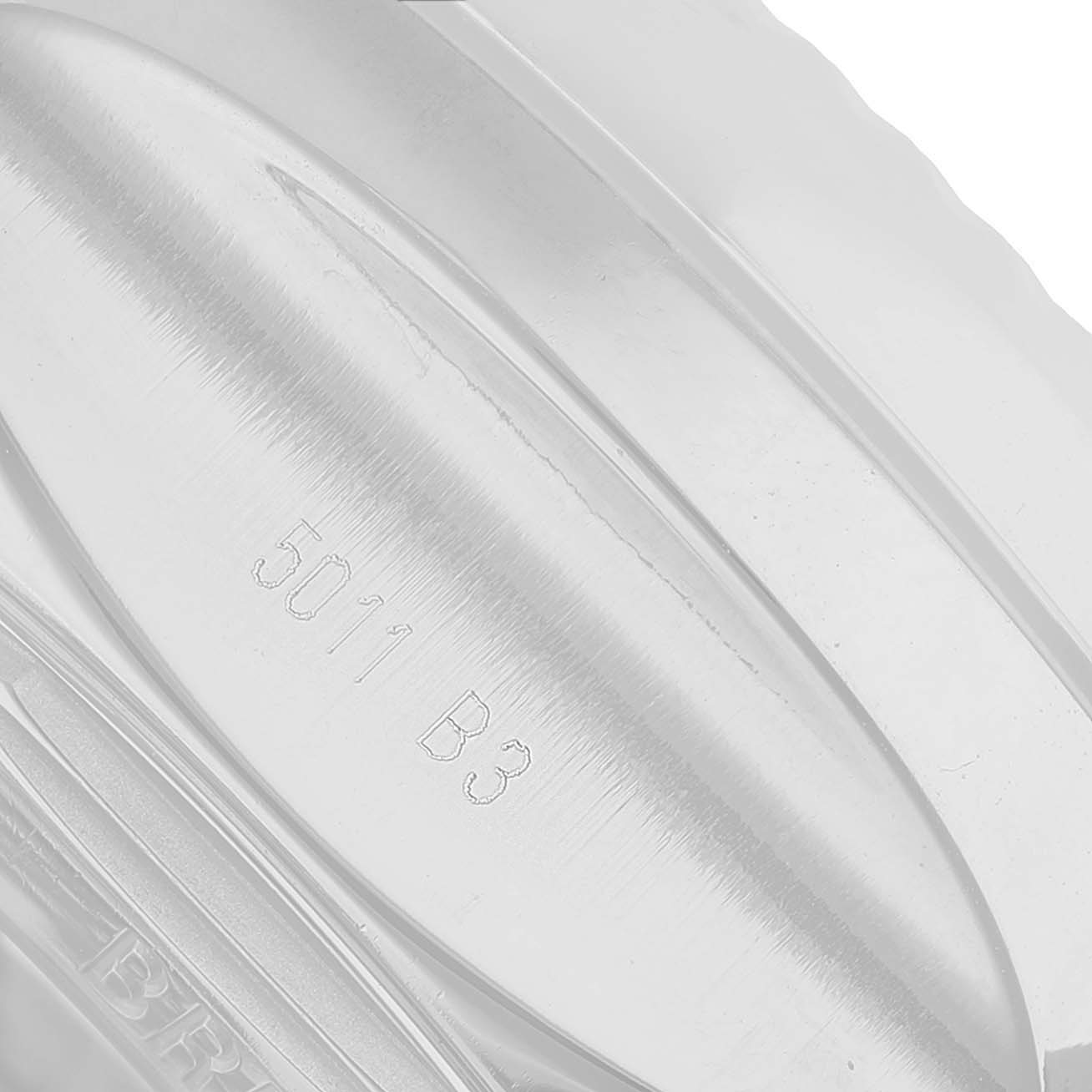 The image shows a close-up of the bezel of a Breitling Bentley A25366 Men's Stainless Steel Silver Dial model, highlighting its engraved details.