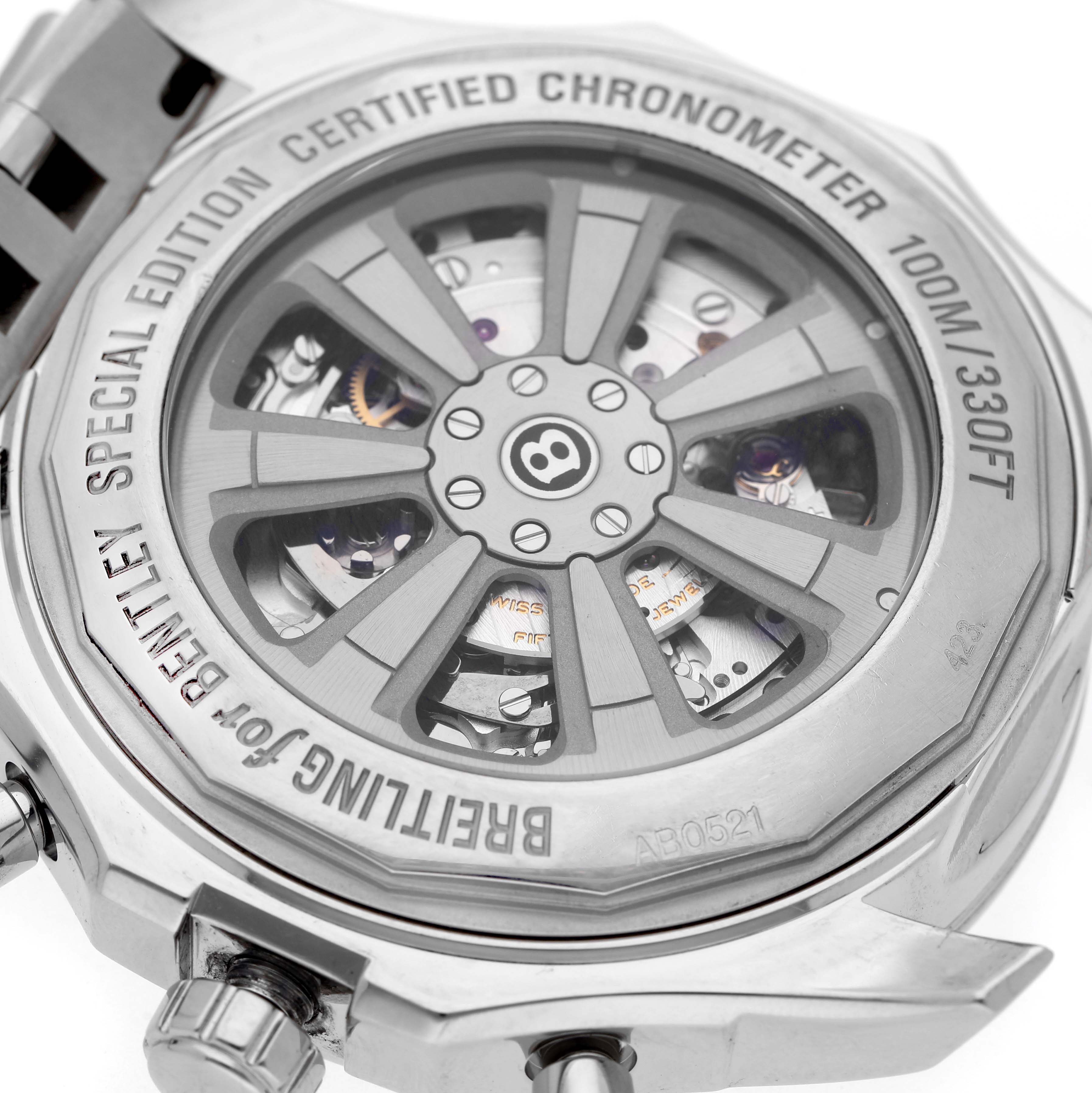 The image shows the back case of a Breitling Bentley AB0521 Men's Stainless Steel Black Dial watch, revealing its inner mechanics through a transparent display.