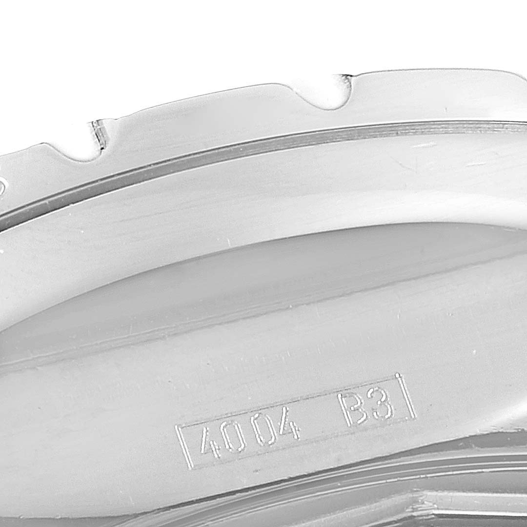 This is a close-up of the bezel of the Bentley model by Breitling, showing part of the watch case with engravings.