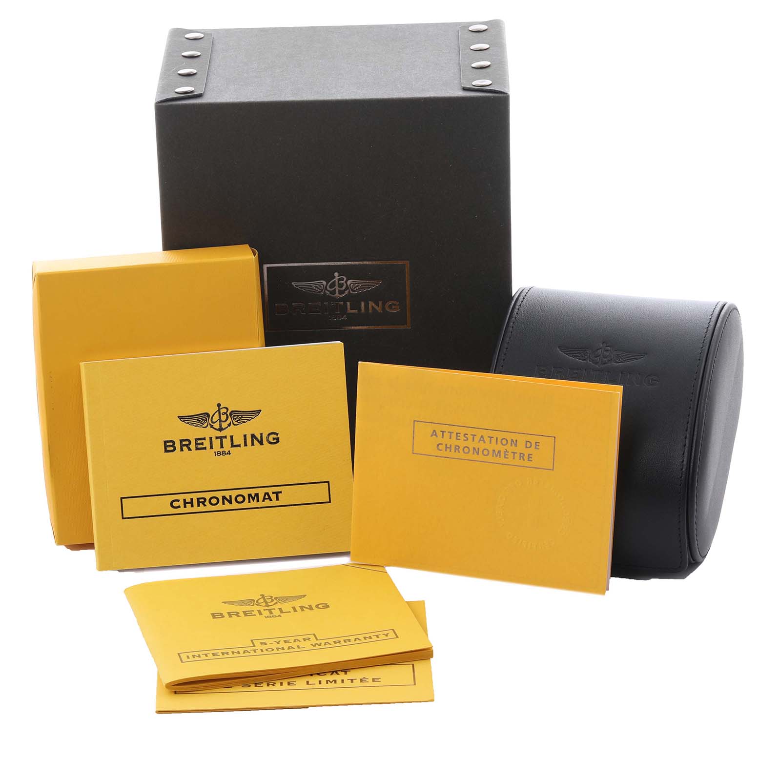 The image shows packaging and documents for a Breitling Chronomat AB0110 Men's Stainless Steel Mother of Pearl Dial AB0110 Men's Stainless Steel Mother of Pearl Dial, including a black box, leather case, and yellow booklets.