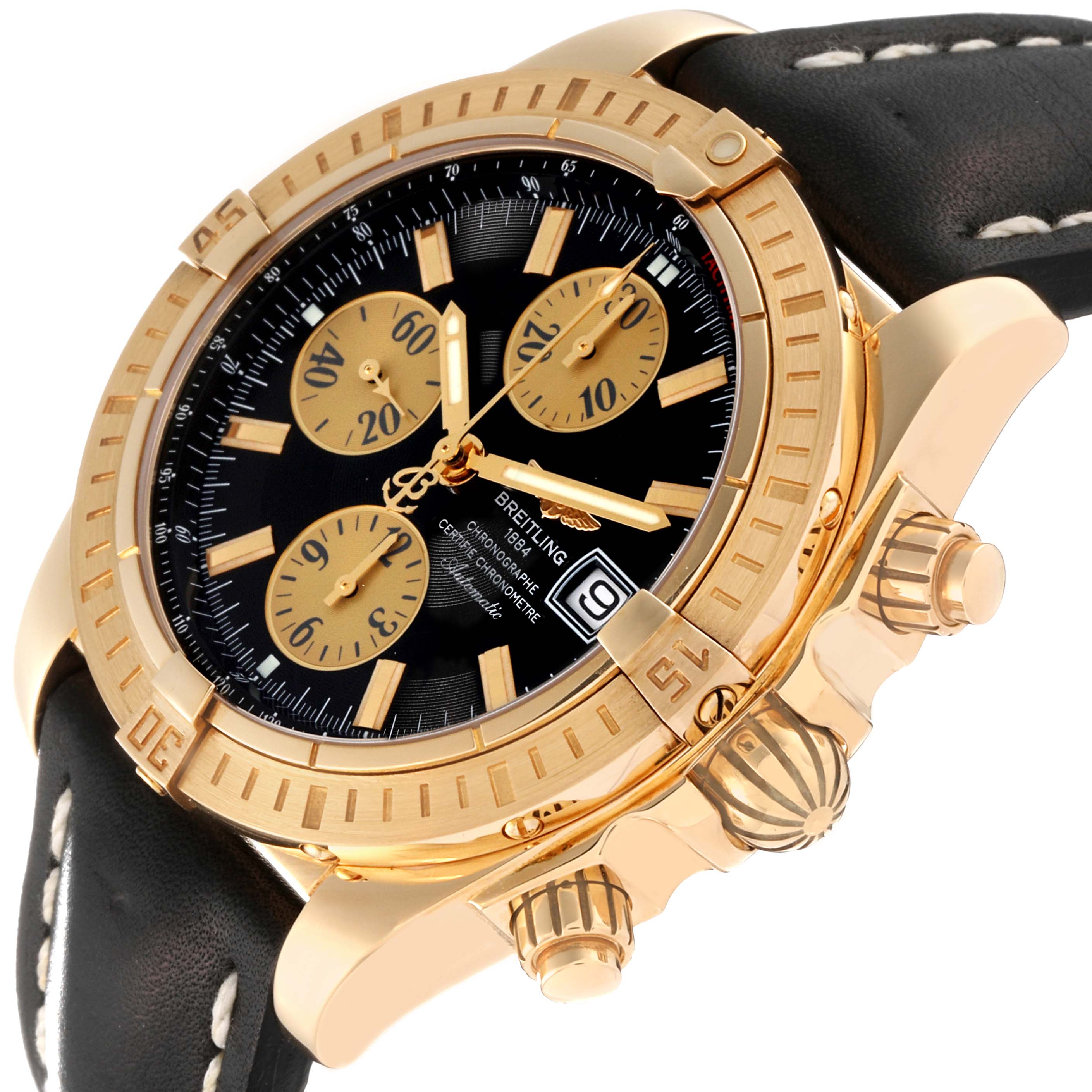 The image shows a Breitling Chronomat K13356 Men
s Yellow Gold Black Dial K13356 Men
s Yellow Gold Black Dial watch at an angle highlighting the bezel, dial, sub-dials, crown, and strap.