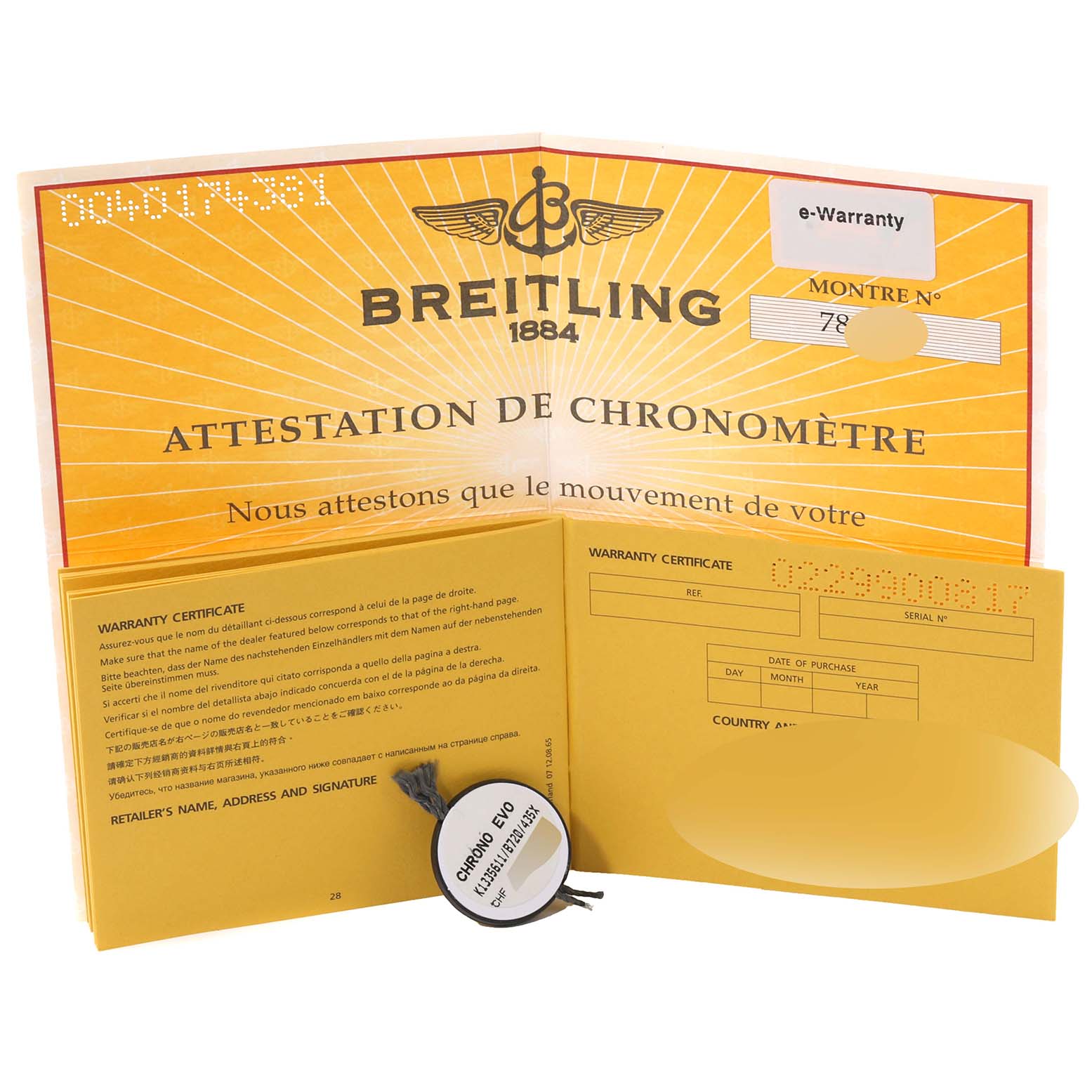 This image shows the warranty and chronometer attestation documents for a Breitling Chronomat K13356 Men
s Yellow Gold Black Dial K13356 Men
s Yellow Gold Black Dial watch.