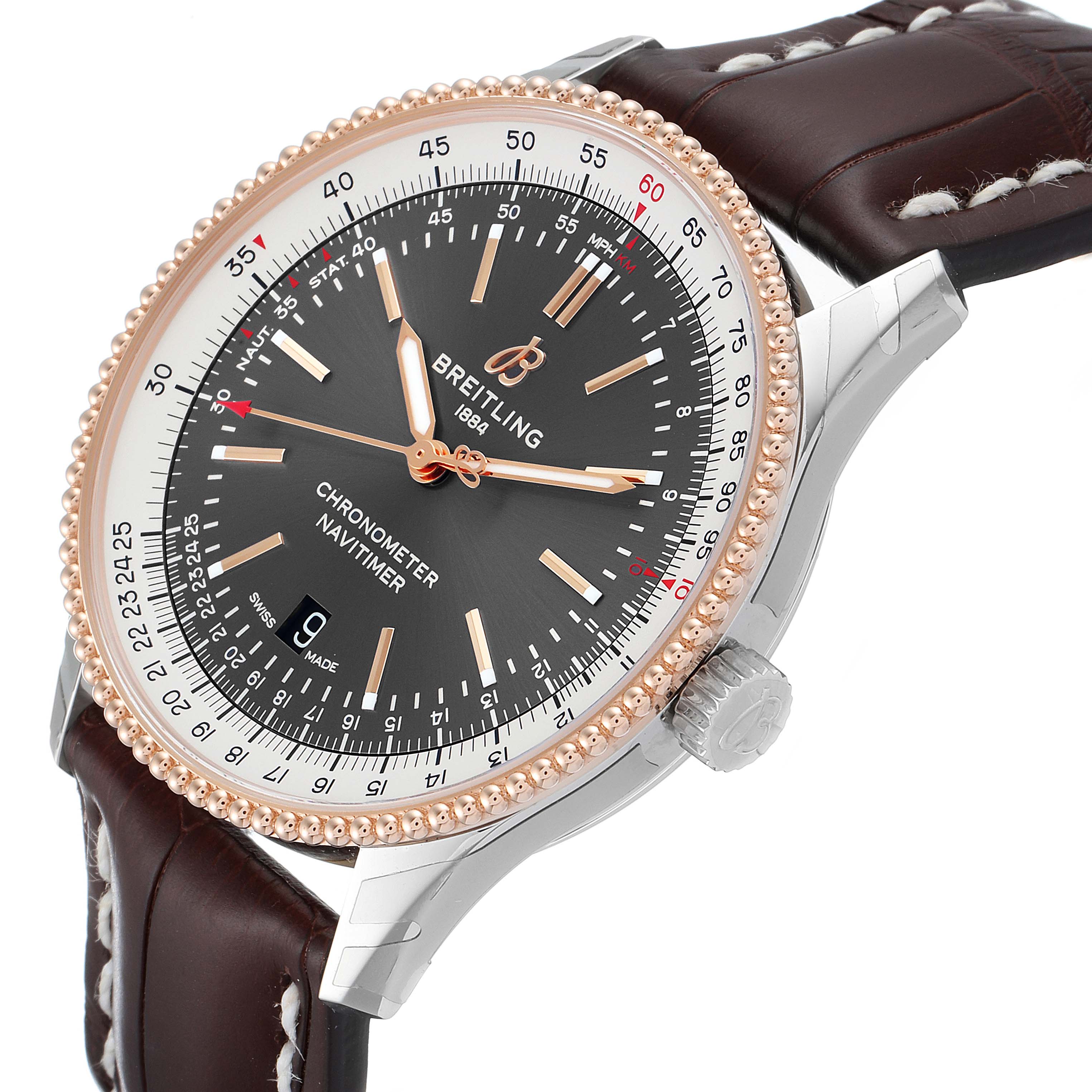 The image shows a Breitling Navitimer U17326211M1P1 Men
s Stainless Steel Grey Dial U17326211M1P1 Men
s Stainless Steel Grey Dial watch with a side angle, highlighting its face, bezel, crown, and leather strap.