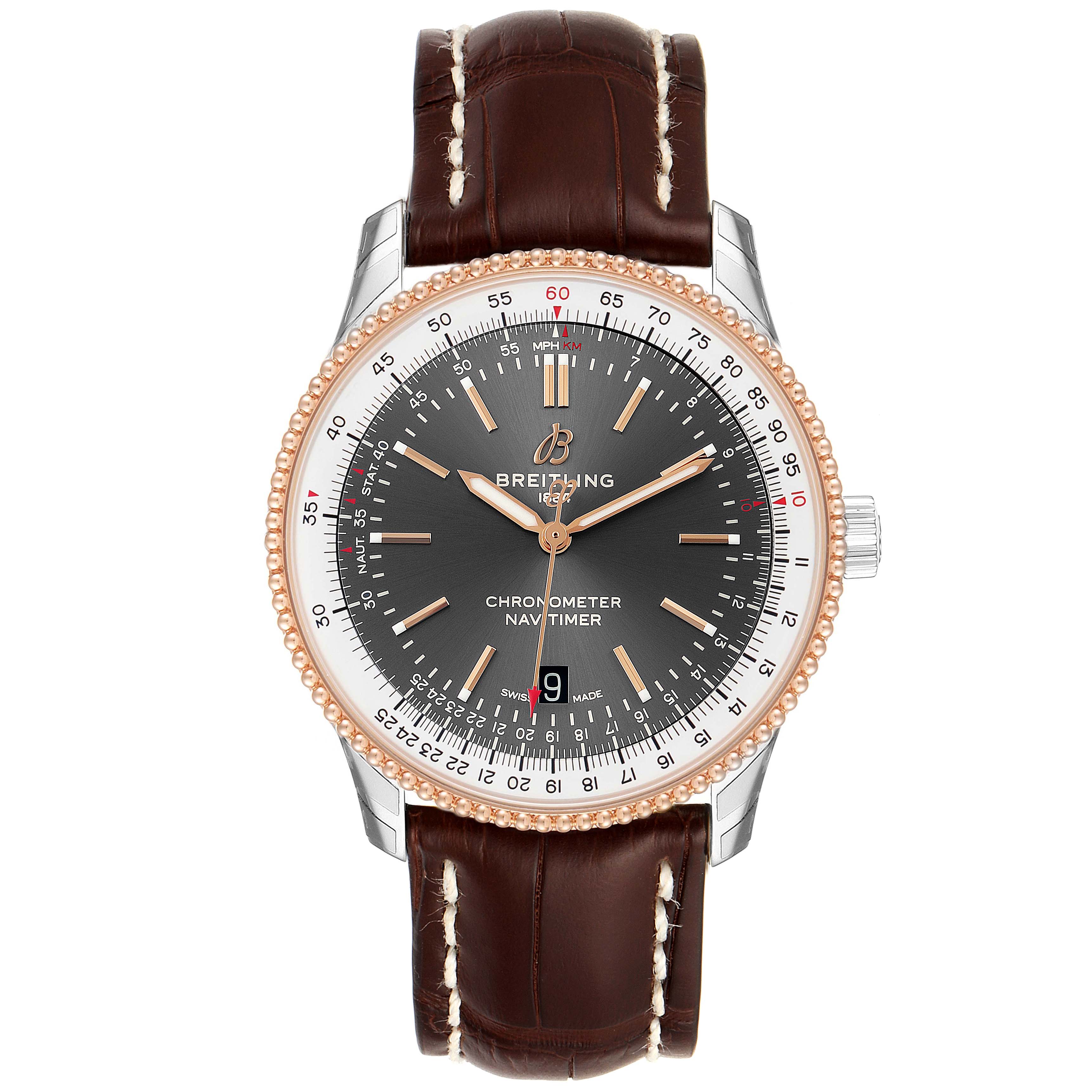The image shows a front view of a Breitling Navitimer U17326211M1P1 Men
s Stainless Steel Grey Dial U17326211M1P1 Men
s Stainless Steel Grey Dial watch with a brown leather strap and a detailed dial.