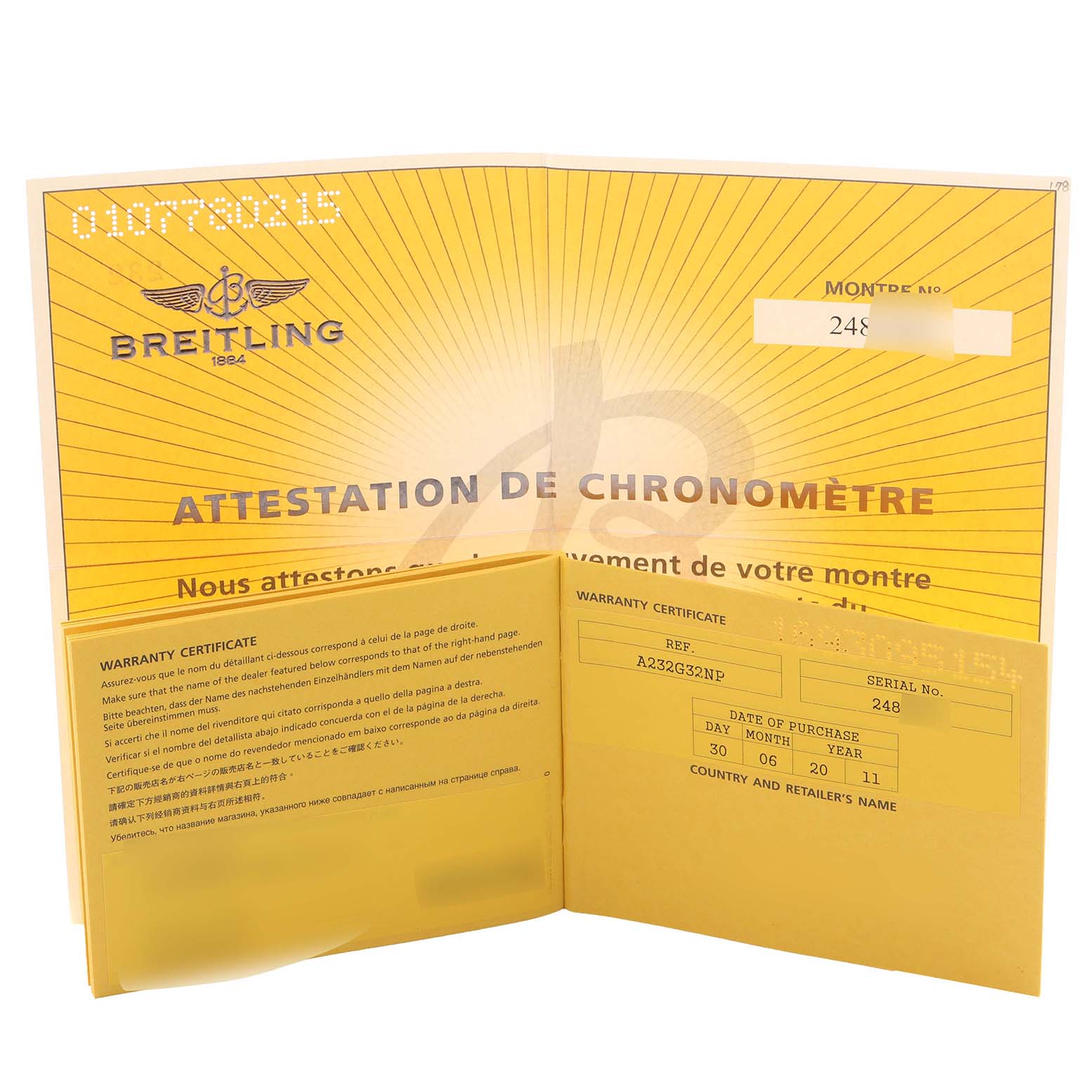 The image shows a warranty certificate and chronometer attestation for a Breitling Navitimer A23322 Men's Stainless Steel Silver Dial A23322 Men's Stainless Steel Silver Dial watch, angled to reveal both documents.