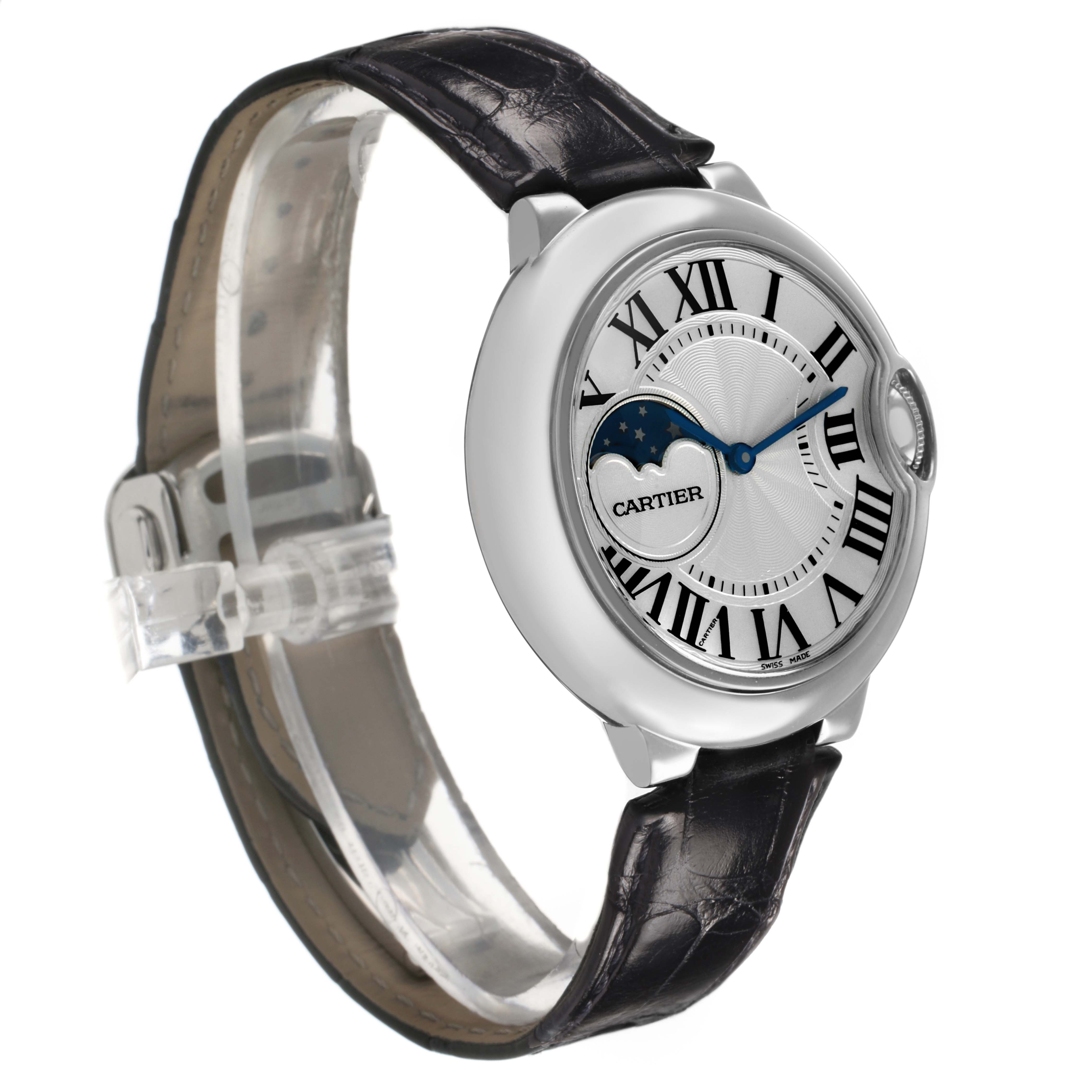 The Cartier Ballon Bleu WSBB0029 Men's Stainless Steel Silver Dial watch is shown at a three-quarter angle, highlighting the face, Roman numerals, blue hands, and leather strap.