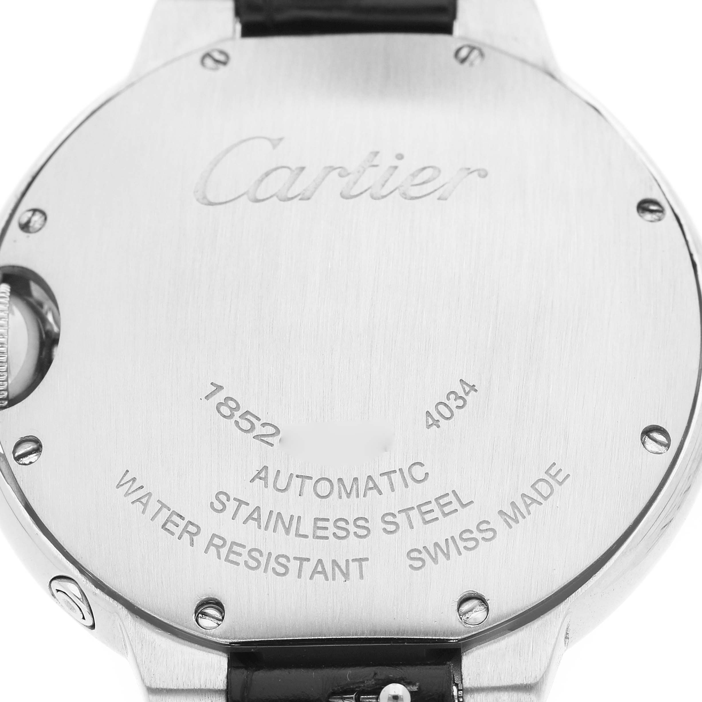The image shows the back of the Cartier Ballon Bleu WSBB0029 Men's Stainless Steel Silver Dial watch, emphasizing its engravings and case details.