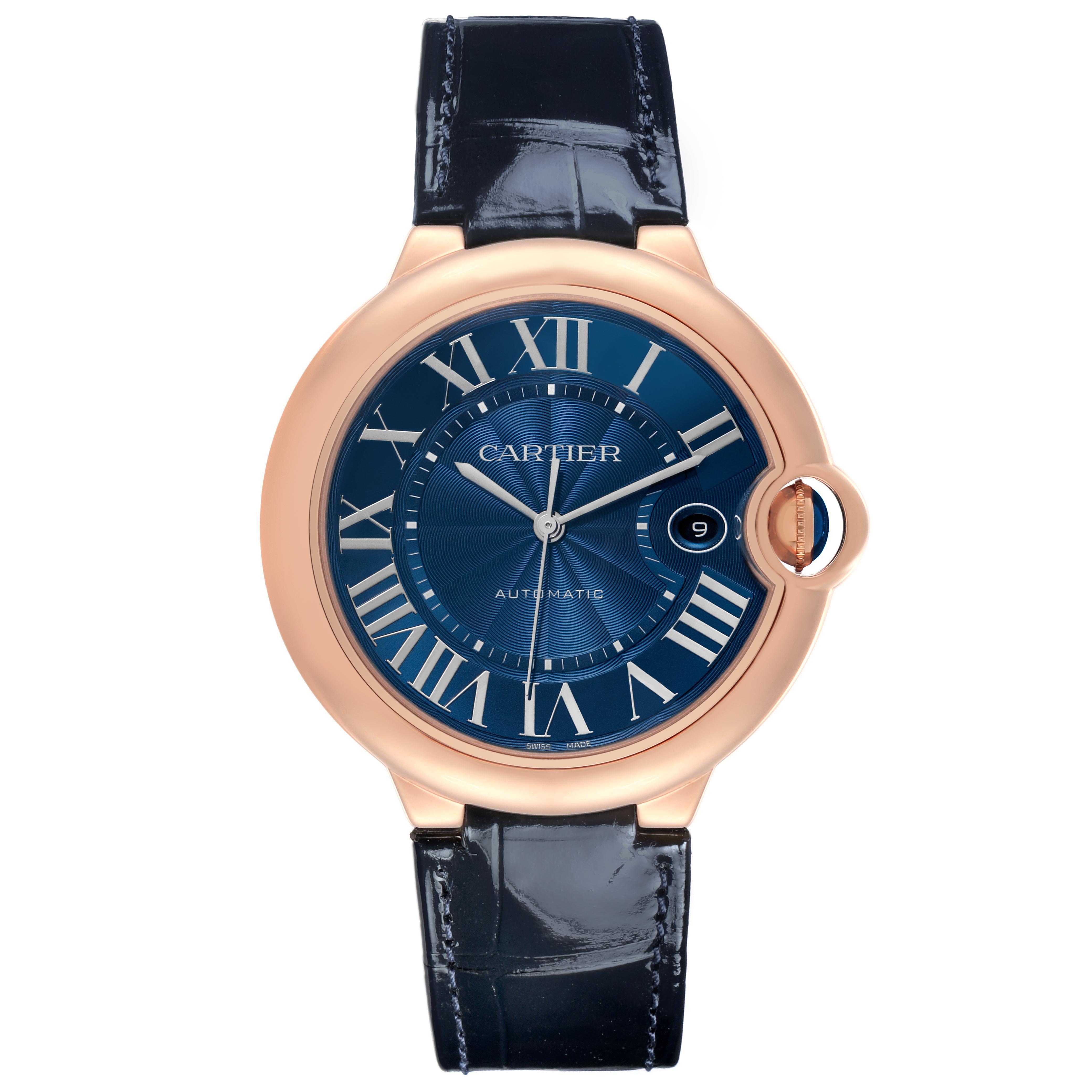 The Cartier Ballon Bleu WGBB0036 Men's Rose Gold Blue Dial WGBB0036 Men's Rose Gold Blue Dial watch is shown from a top-down angle, highlighting the blue dial, rose gold case, and leather strap.
