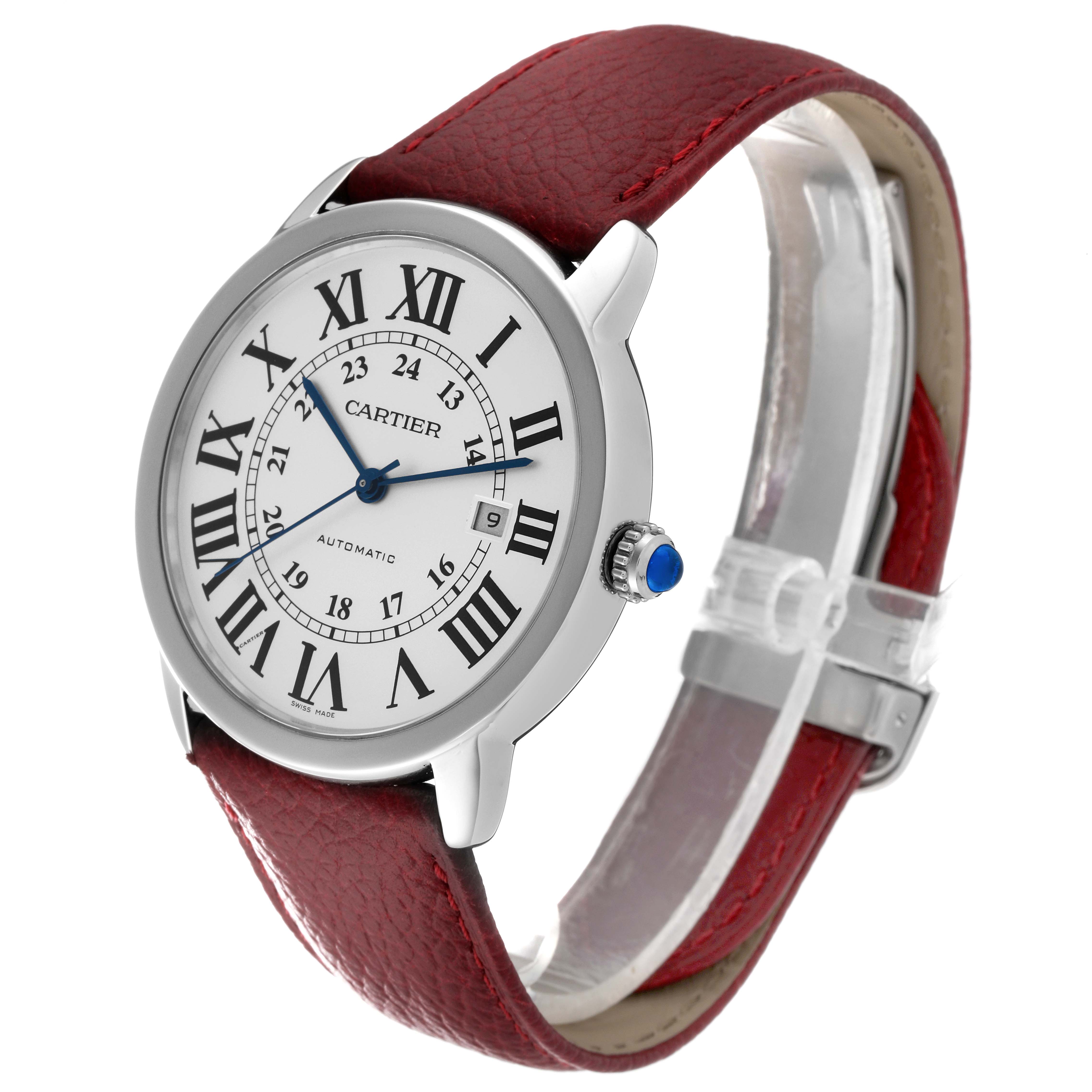 The Cartier Ronde W6701010 Men
s Stainless Steel Silver Dial W6701010 Men
s Stainless Steel Silver Dial watch is shown at an angle highlighting its red leather strap, white dial with Roman numerals, and blue hands.