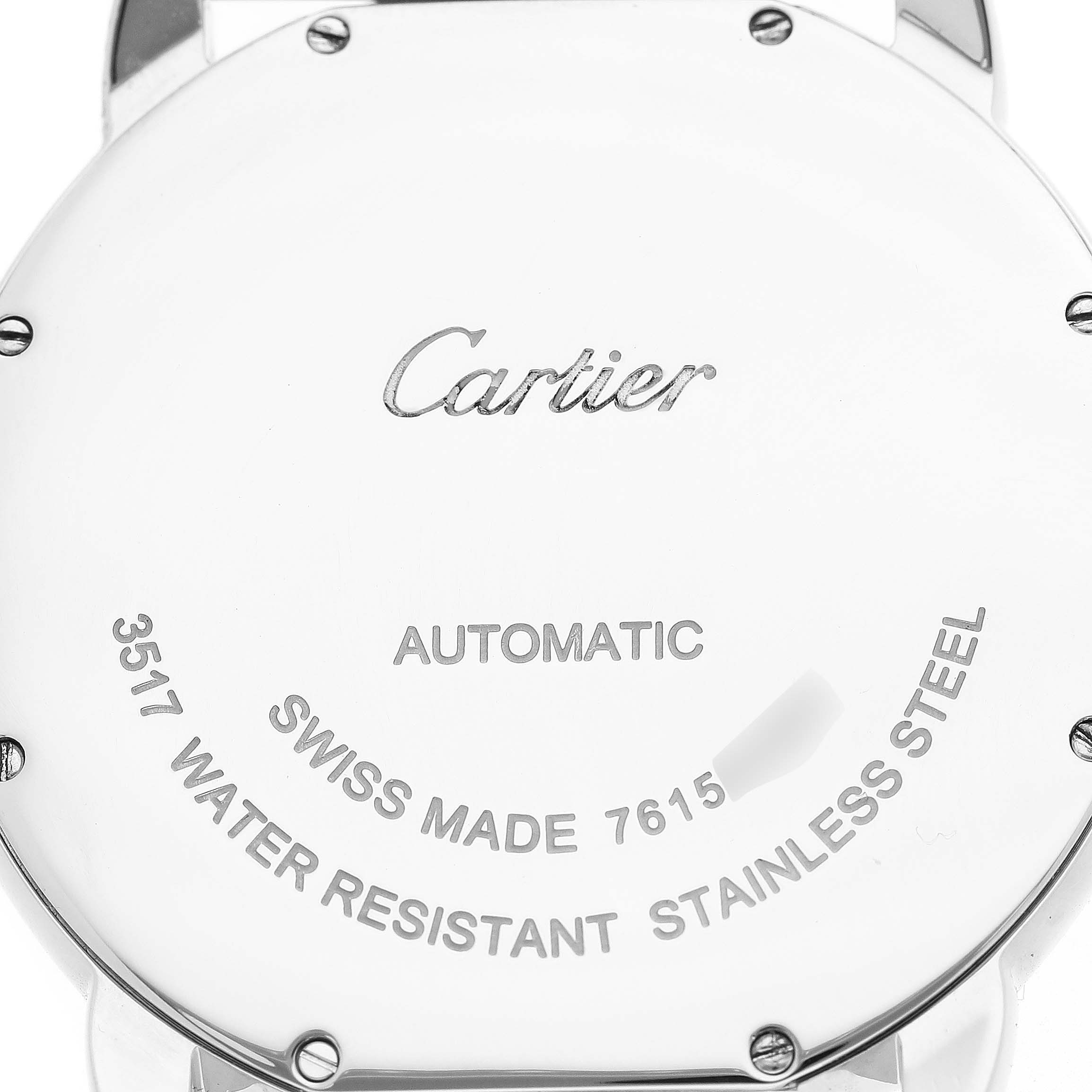 The image shows the back case of the Cartier Ronde W6701011 Men's Stainless Steel Silver Dial model, highlighting branding and specifications like "Automatic" and "Swiss Made".