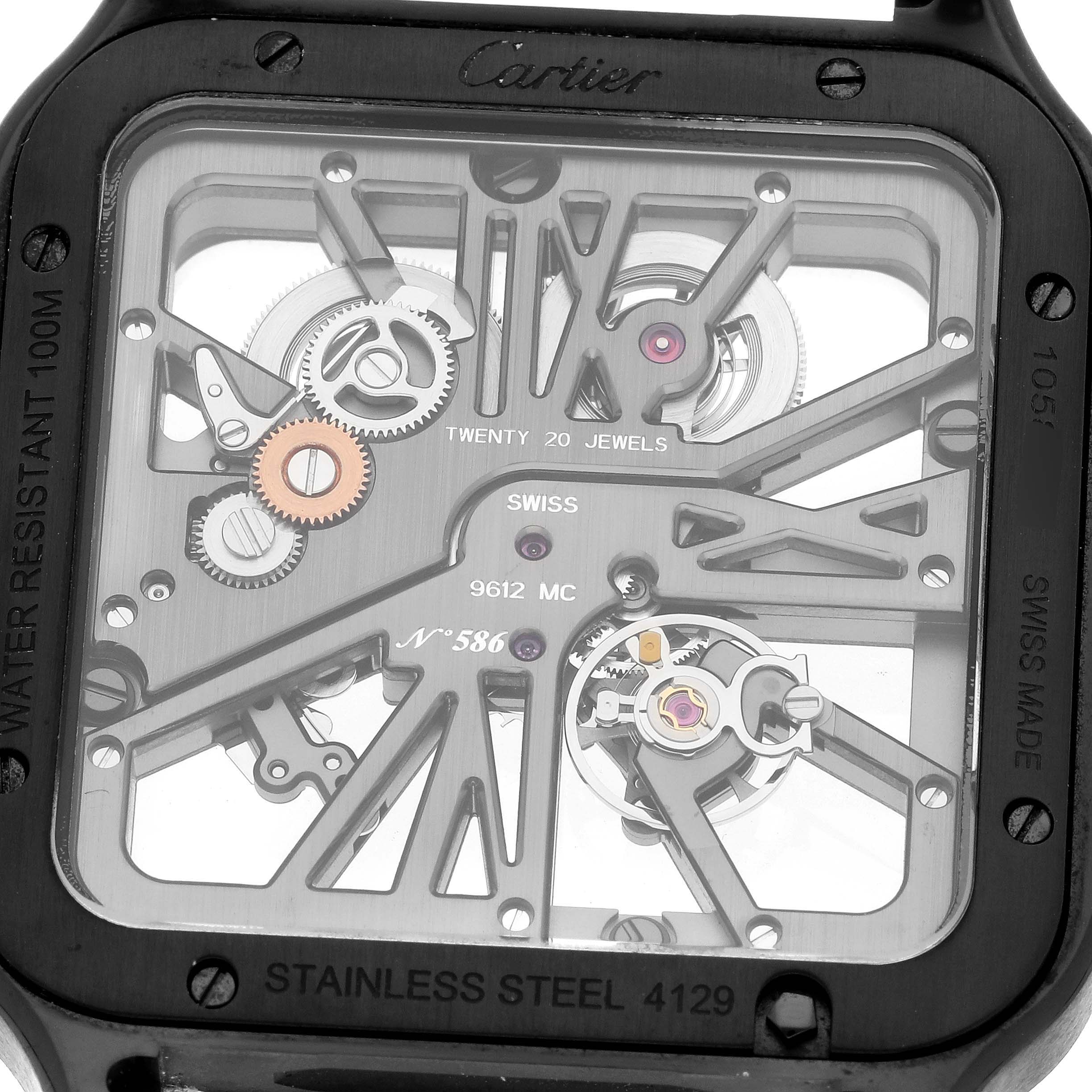 Close-up view showing the movement and inner workings of a Cartier Santos WHSA0009 Men's Stainless Steel Transparent Dial WHSA0009 Men's Stainless Steel Transparent Dial model through the transparent dial.