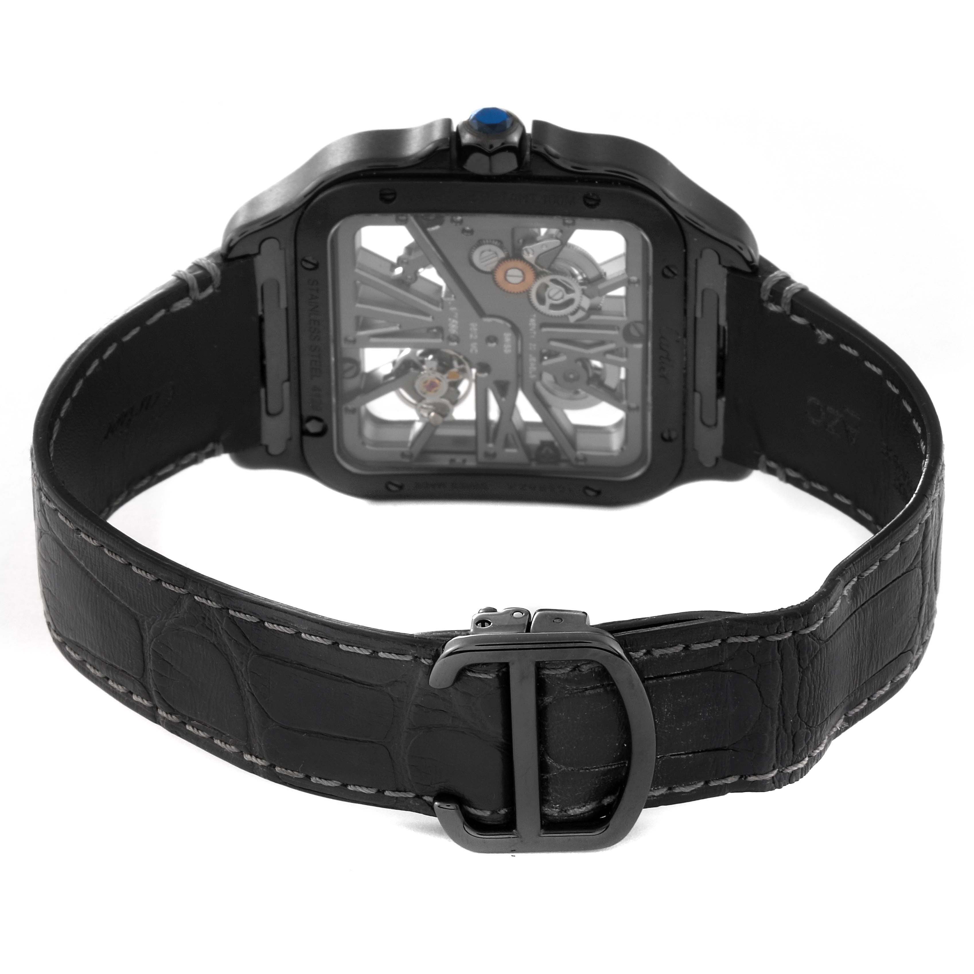 The image shows the backside of a Cartier Santos WHSA0009 Men's Stainless Steel Transparent Dial WHSA0009 Men's Stainless Steel Transparent Dial watch with a visible skeleton mechanism and a black leather strap.