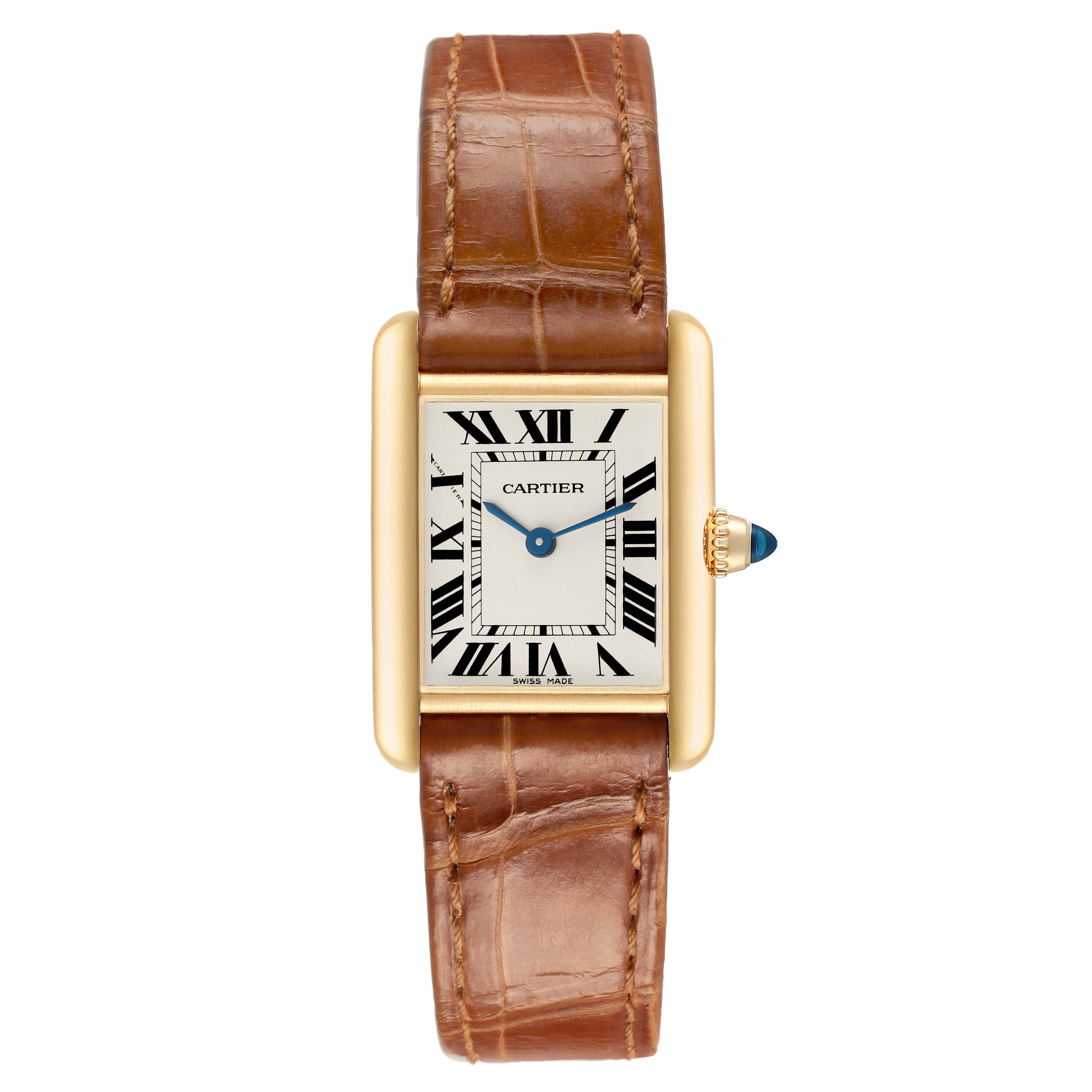 The Cartier Tank Louis W1529856 Women's Yellow Gold Silver Dial watch is shown from a top-down angle, highlighting the face, Roman numerals, and brown leather strap.