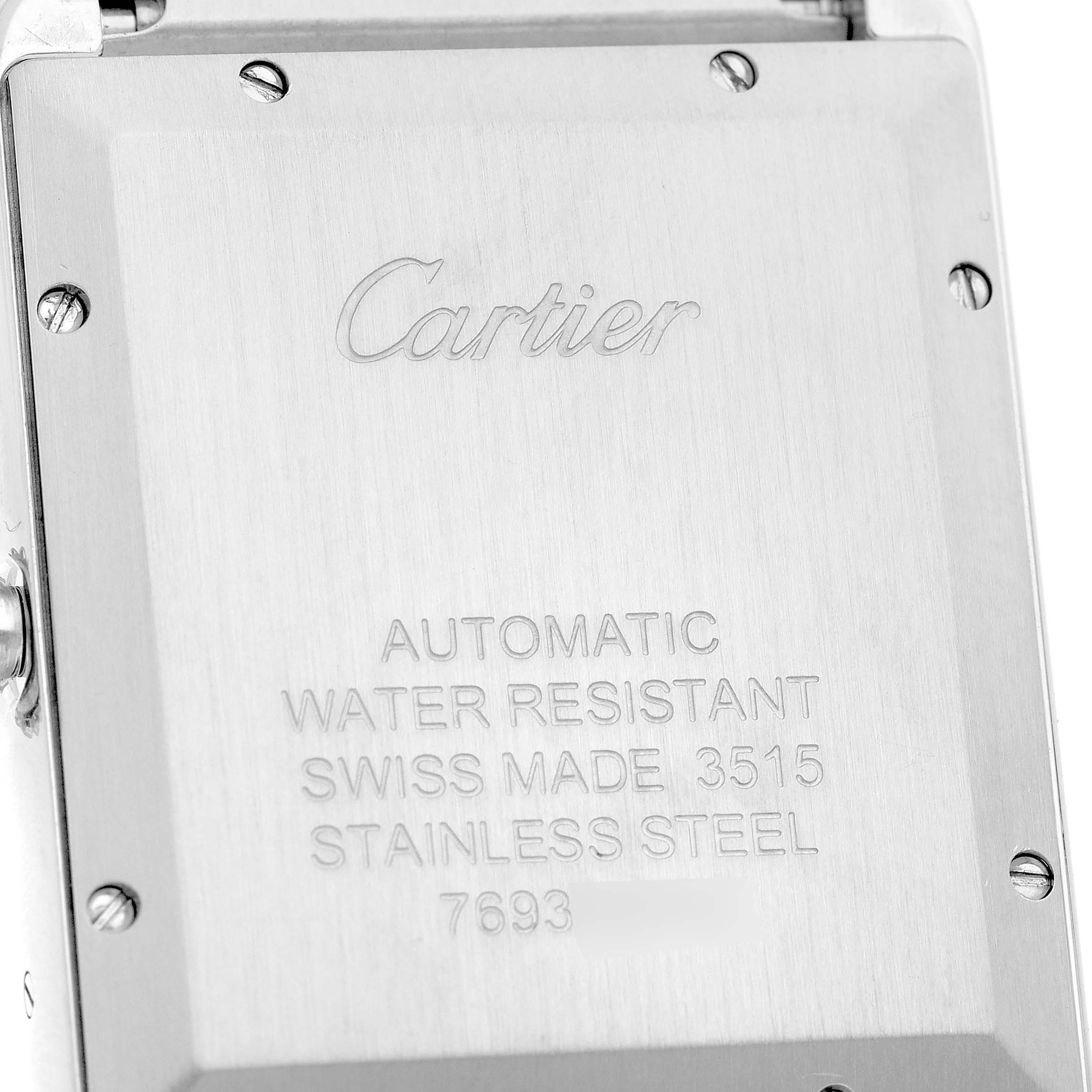 This image shows the stainless steel case back of the Cartier Tank Solo W5200028 Men's Stainless Steel Silver Dial, featuring engraved specifications.