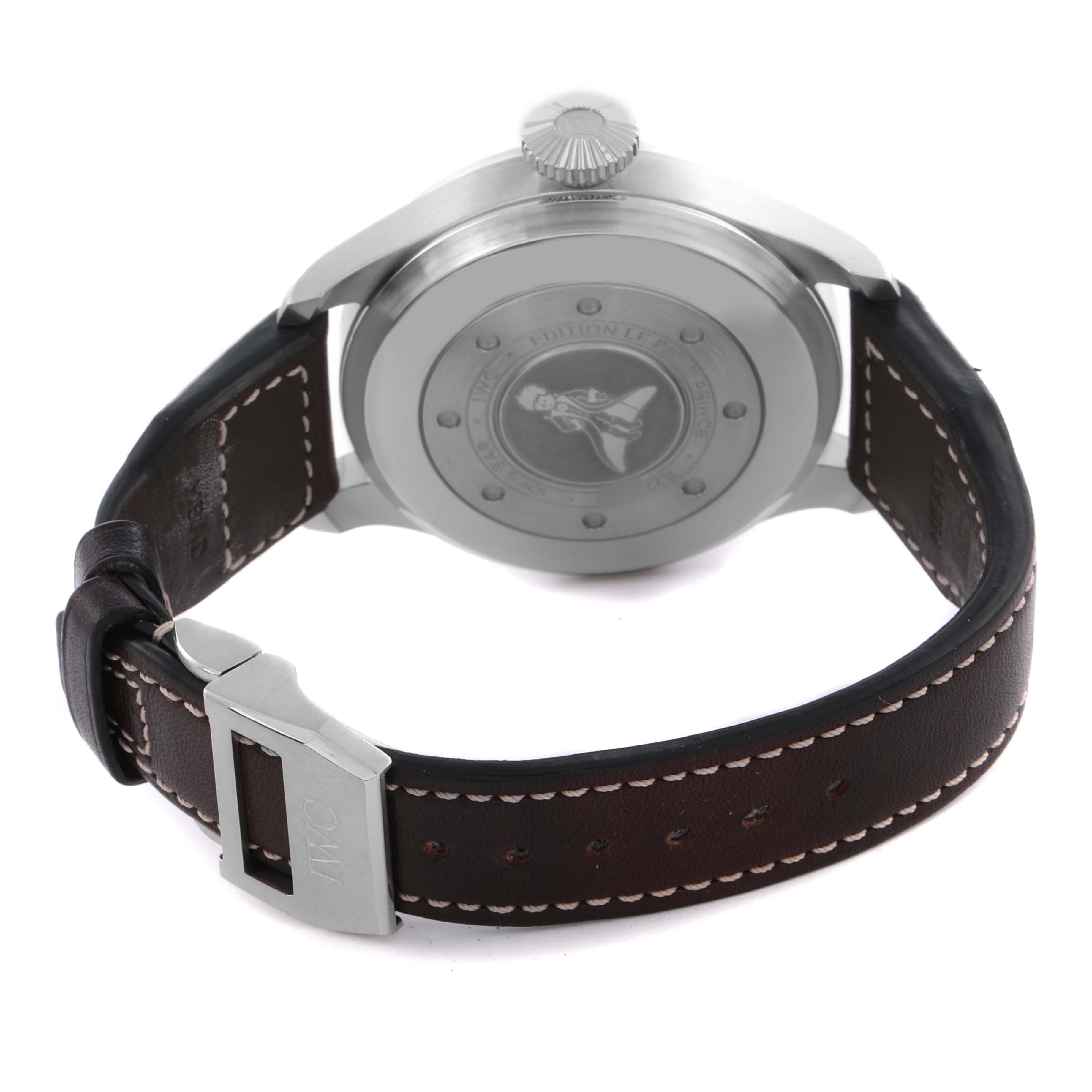 The IWC Pilot IW501002 Men's Stainless Steel Blue Dial IW501002 Men's Stainless Steel Blue Dial watch is shown from the back, displaying the case back, leather strap, and clasp.