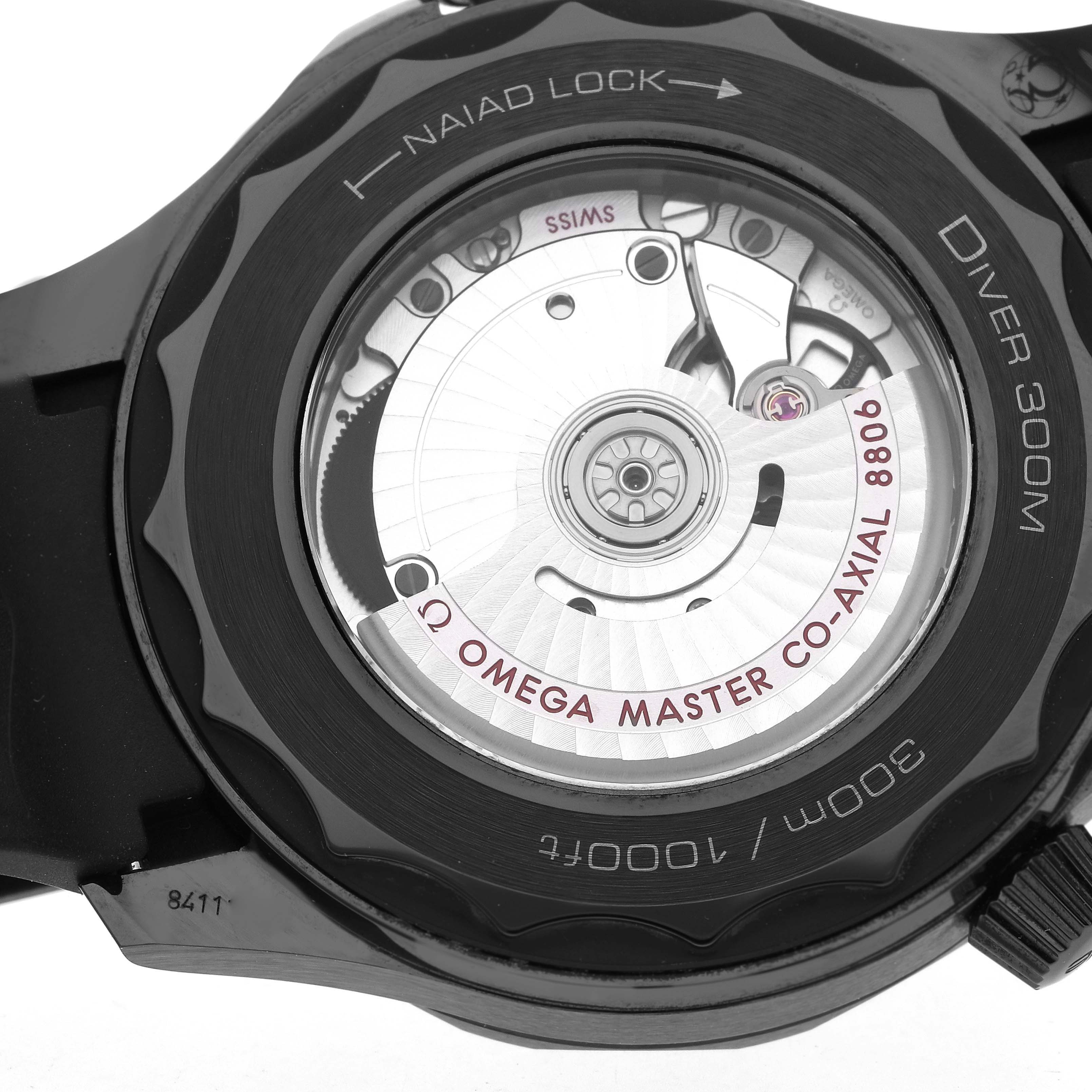 The image shows the back view of an Omega Seamaster 210.92.44.20.01.003 Men's Ceramic Black Dial 210.92.44.20.01.003 Men's Ceramic Black Dial, highlighting its movement and case back details.