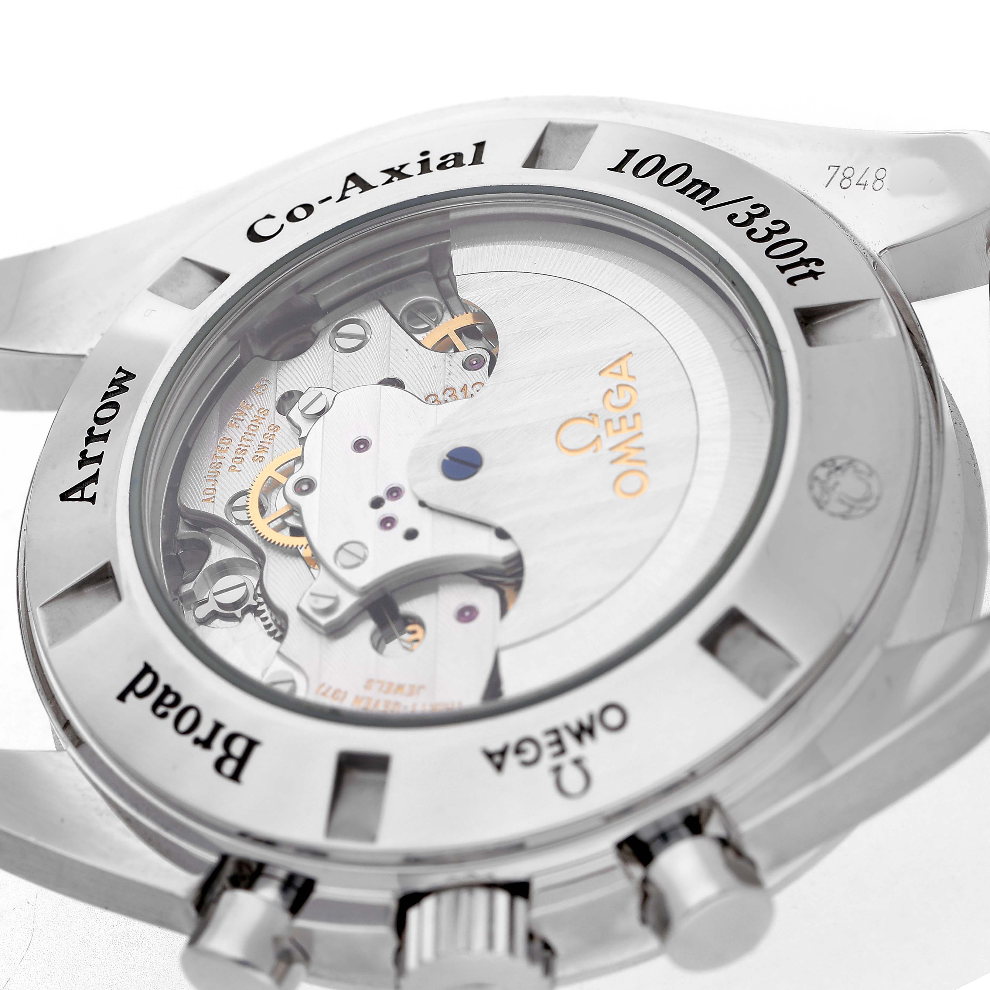 The image shows the back view of an Omega Speedmaster 321.13.44.50.01.001 Men's Stainless Steel Black Dial watch, highlighting its Co-Axial movement and transparent case back.