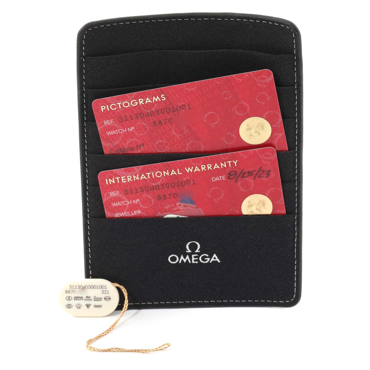 This image shows the warranty cards and tag for an Omega Speedmaster 311.30.40.30.01.001 Men
s Stainless Steel Black Dial 311.30.40.30.01.001 Men
s Stainless Steel Black Dial watch.