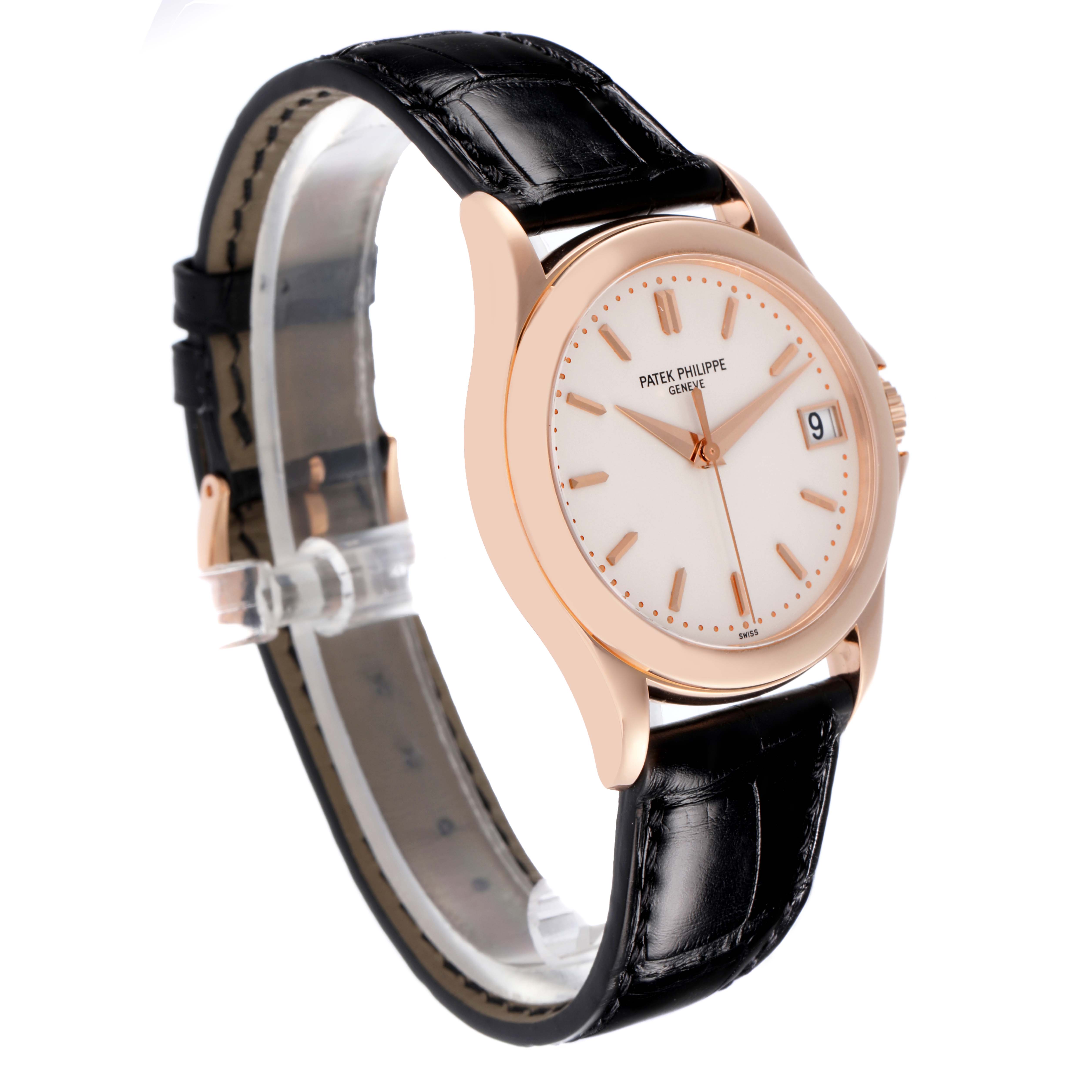 The Patek Philippe Calatrava 5107R Men's Rose Gold Silver Dial 5107R Men's Rose Gold Silver Dial watch is shown at a side angle, displaying the dial, case, crown, and black strap.