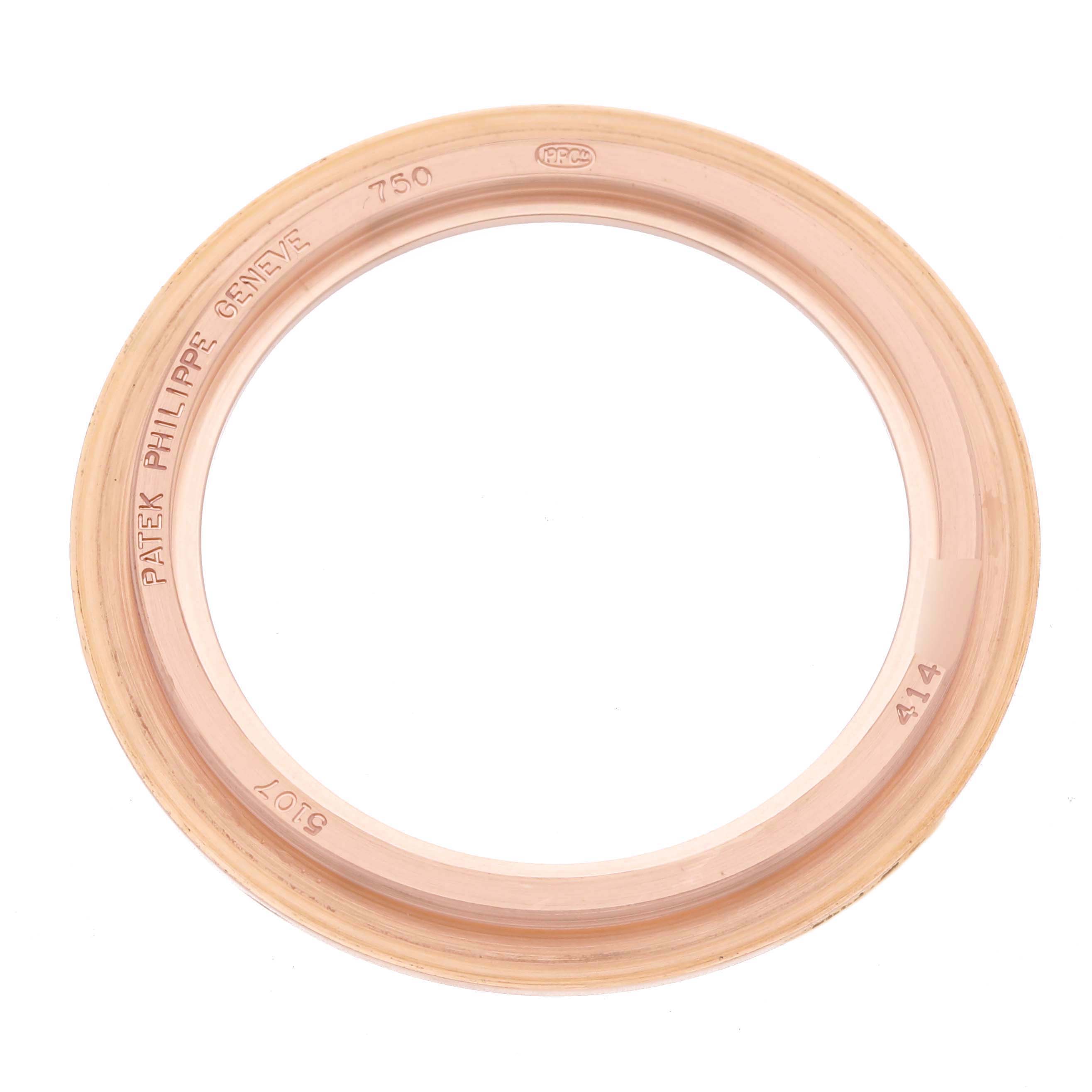 The image shows a rose gold bezel from a Patek Philippe Calatrava 5107R Men's Rose Gold Silver Dial 5107R Men's Rose Gold Silver Dial watch, viewed from above.