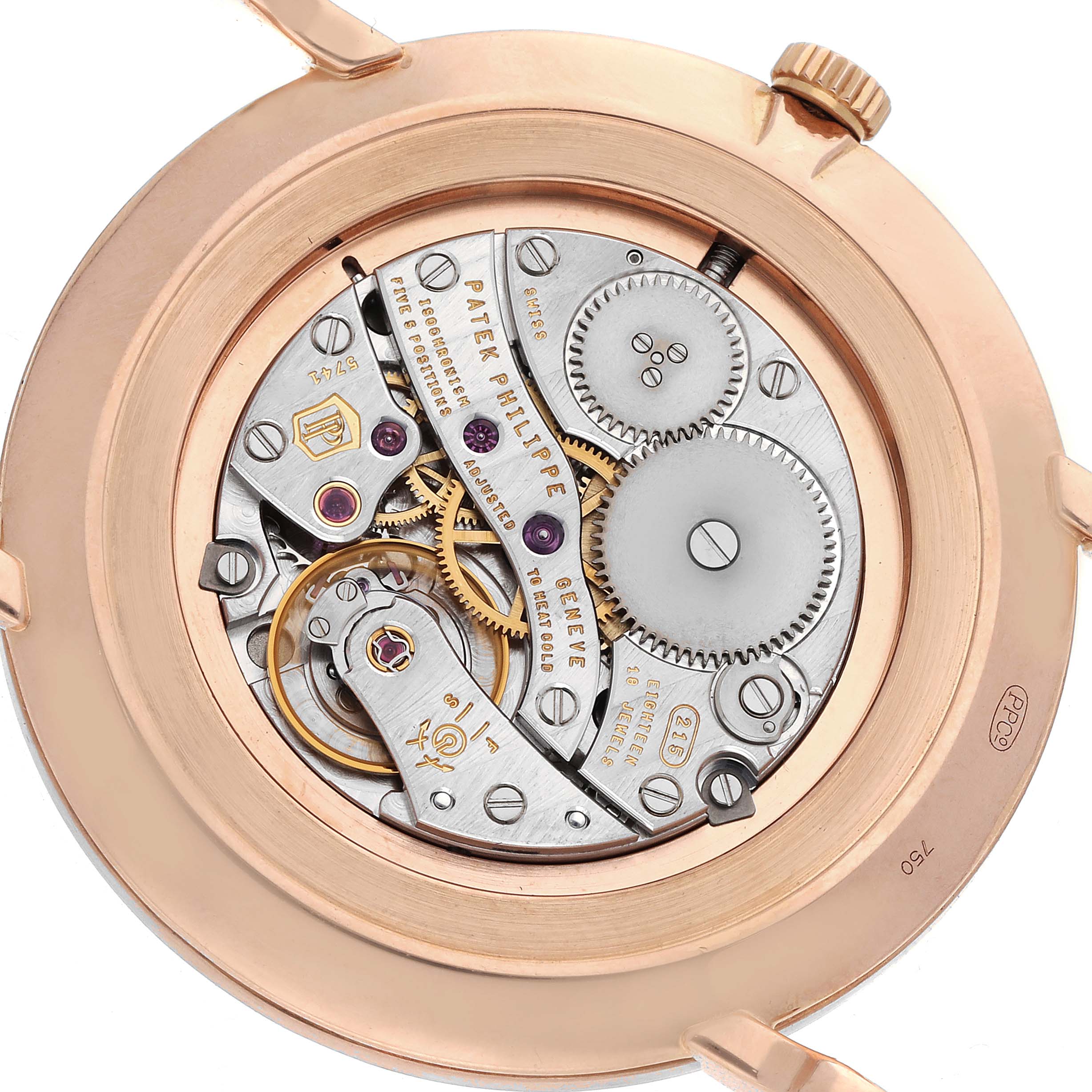 The image shows the movement of a Patek Philippe Calatrava 5119R-001 Men's Rose Gold White Dial 5119R-001 Men's Rose Gold White Dial watch from a rear angle, displaying gears and intricate components.