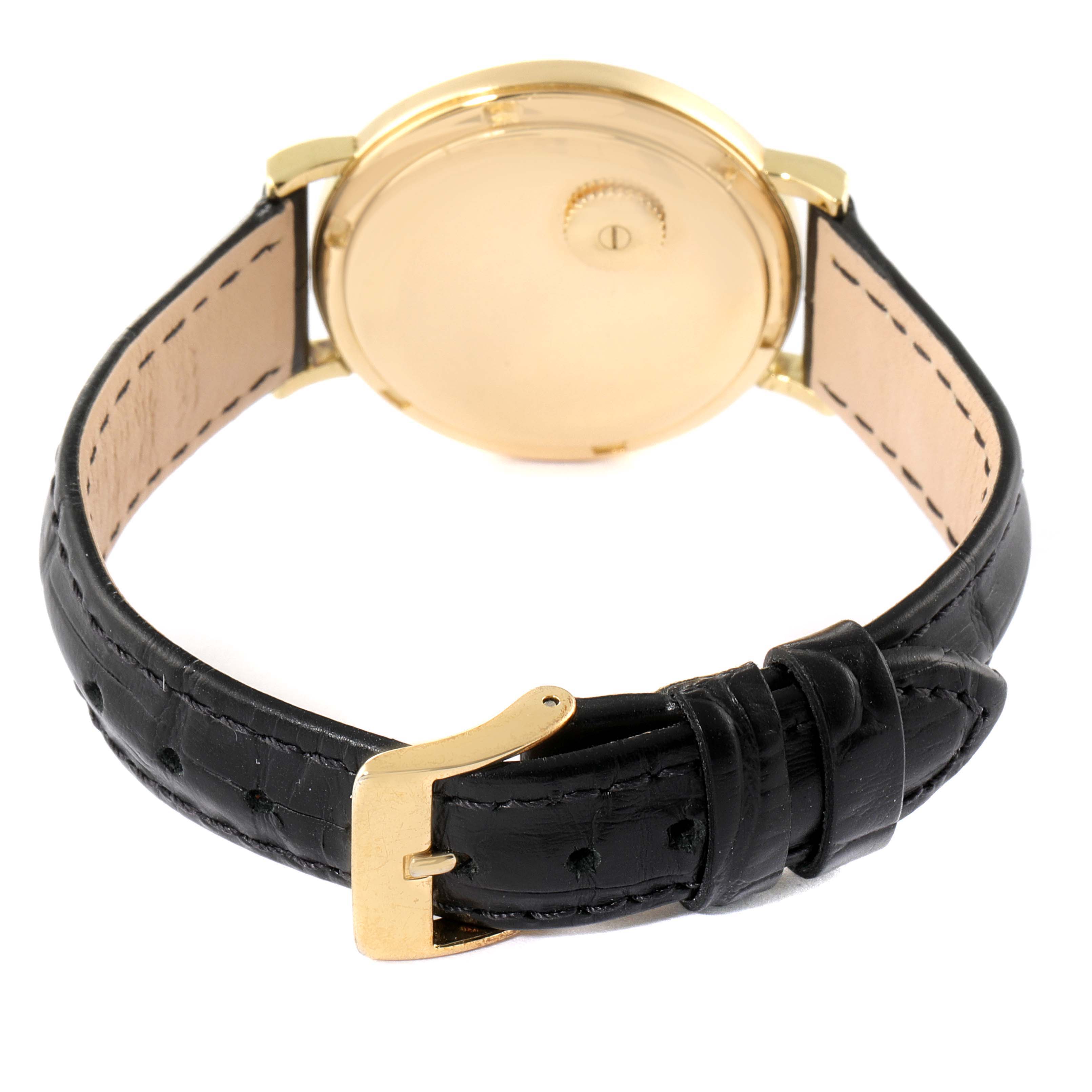 This image shows the back case and strap of a Calatrava model by Patek Philippe, viewed from the reverse angle.