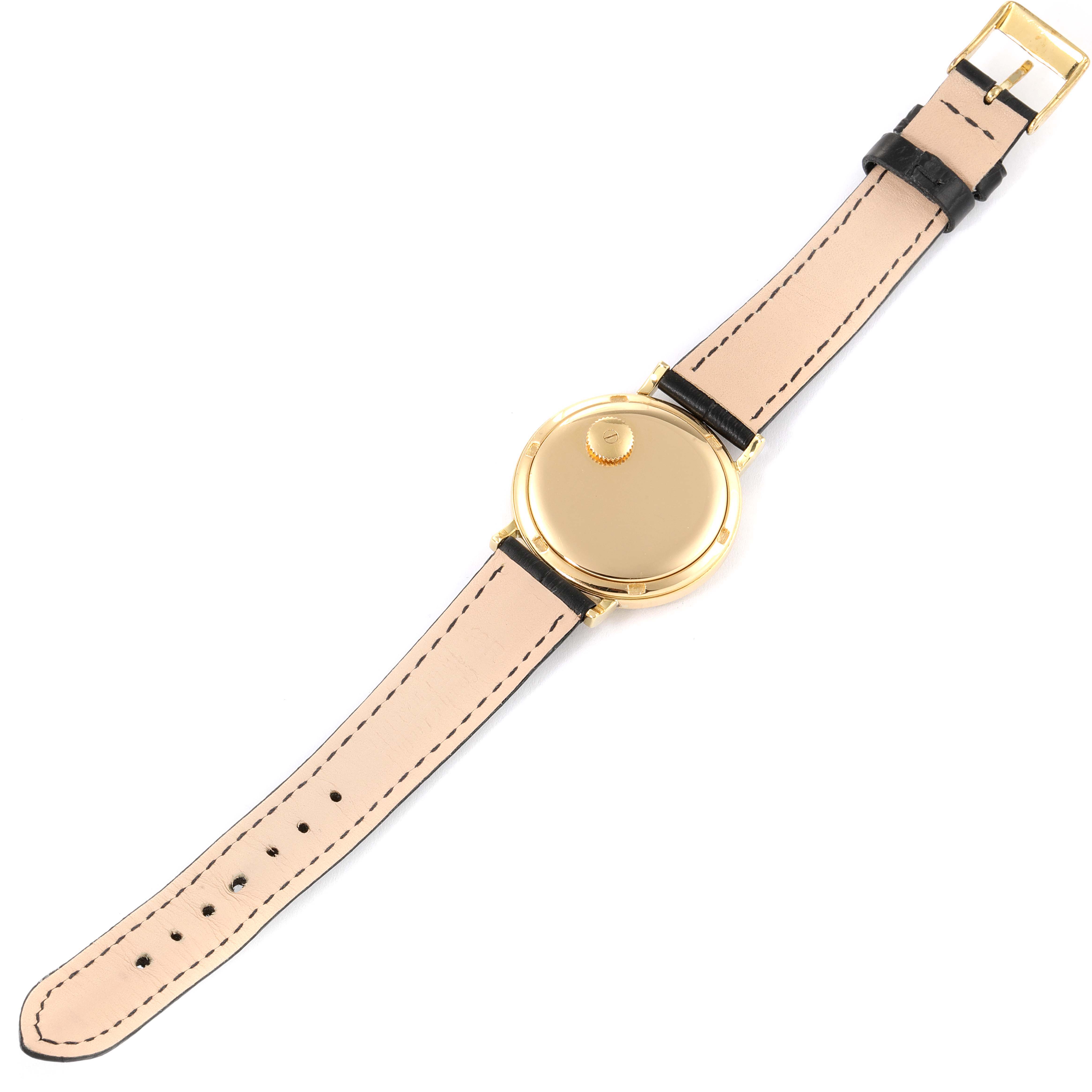 The image shows the back view of a Patek Philippe Calatrava 3569 Men's Yellow Gold Black Dial 3569 Men's Yellow Gold Black Dial watch, including the case back, leather strap, and buckle.