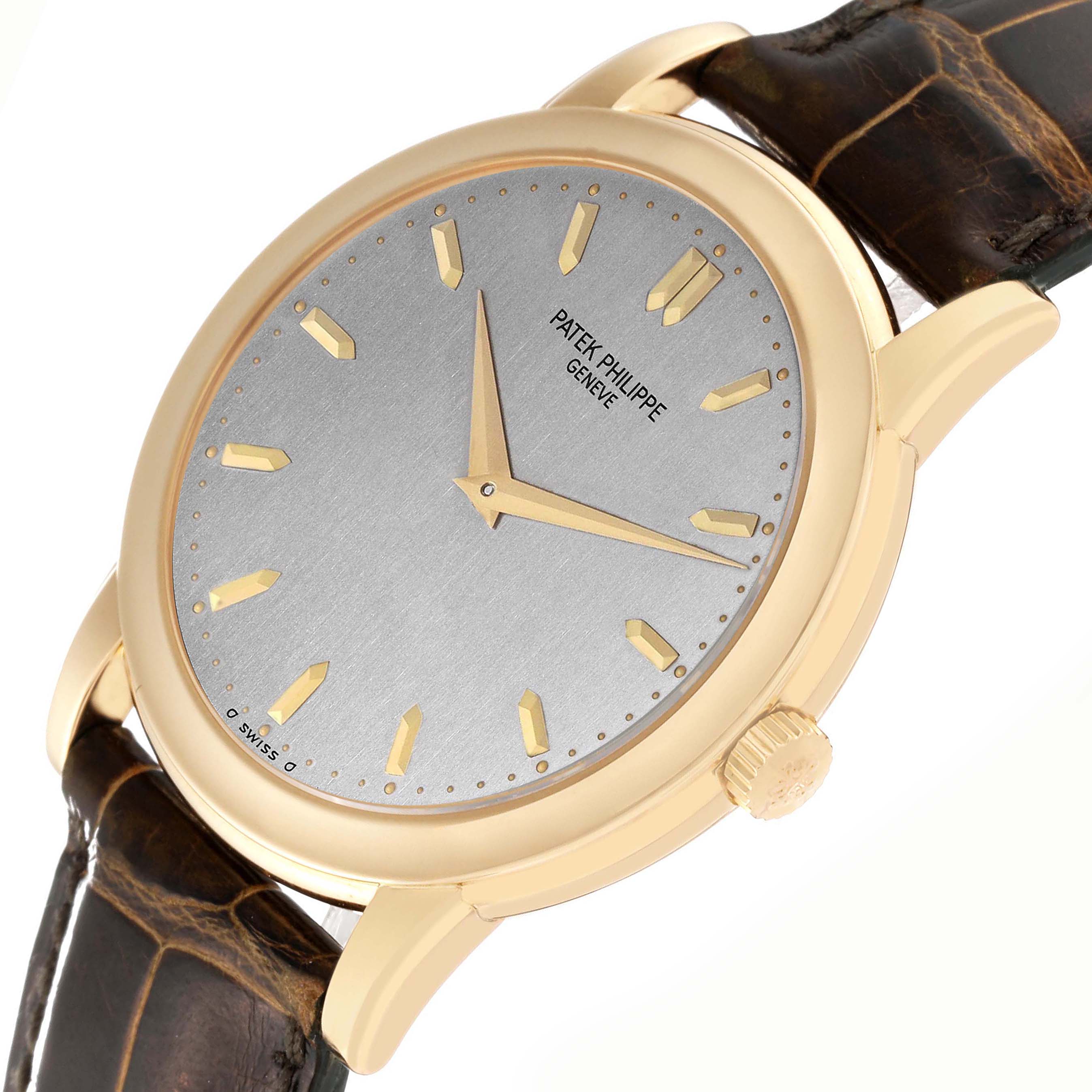 The Patek Philippe Calatrava 5032 Men's Yellow Gold Silver Dial 5032 Men's Yellow Gold Silver Dial watch is shown at a slight angle, displaying the dial, crown, case, and part of the leather strap.