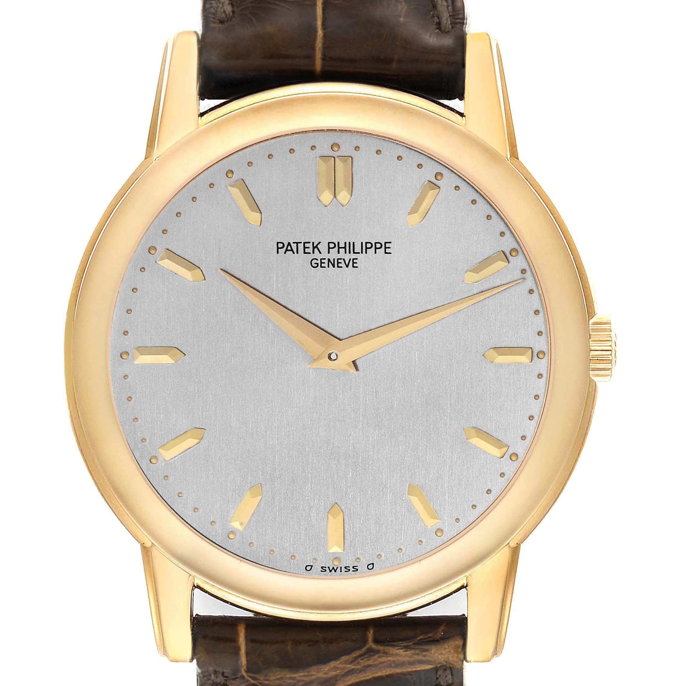 The image shows a front view of the Patek Philippe Calatrava 5032 Men's Yellow Gold Silver Dial watch, highlighting the dial, hands, and brown leather strap.