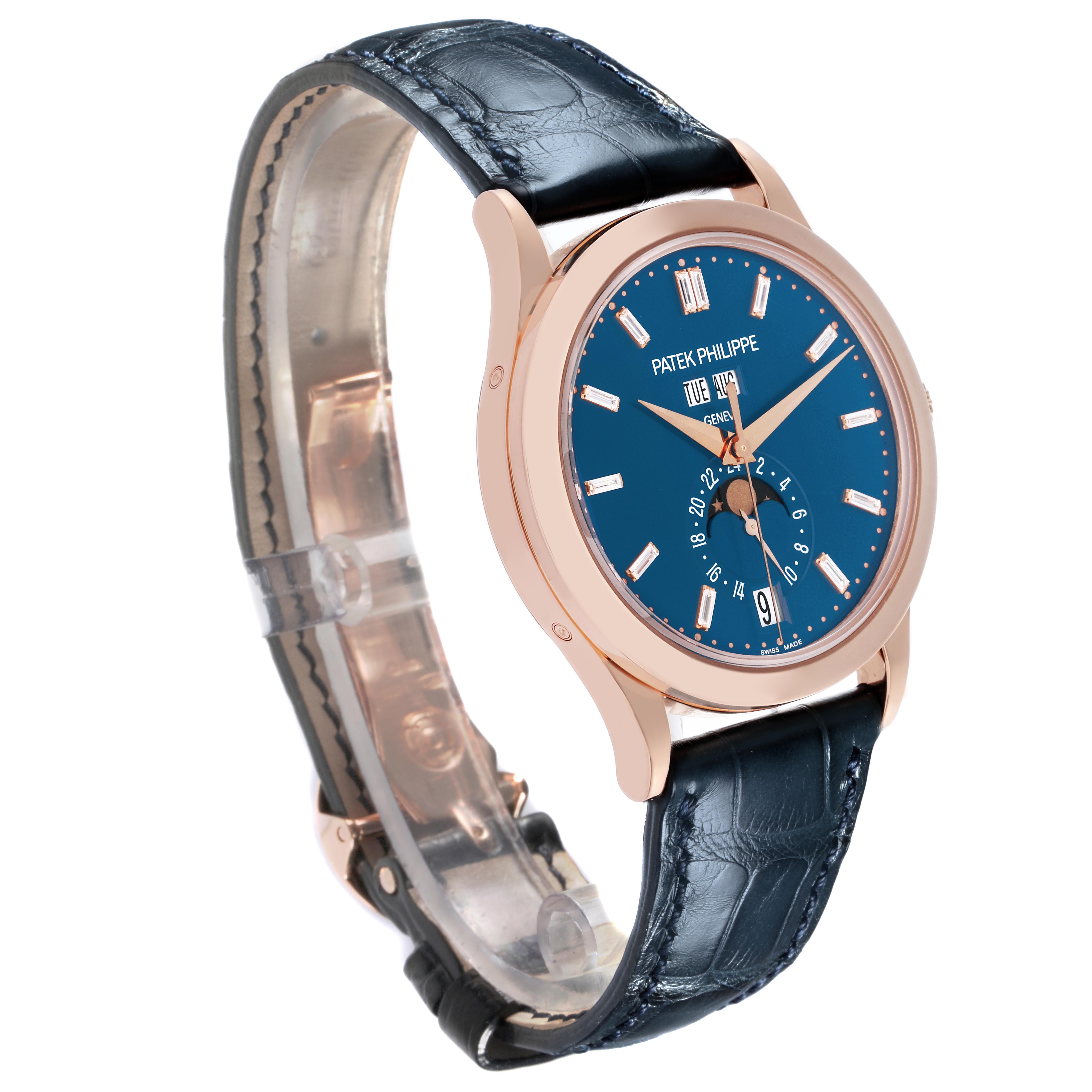 The Patek Philippe Complications 5396R-014 Men
s Rose Gold Blue Dial 5396R-014 Men
s Rose Gold Blue Dial is shown at a slight side angle, displaying its blue dial, rose gold case, and leather strap.