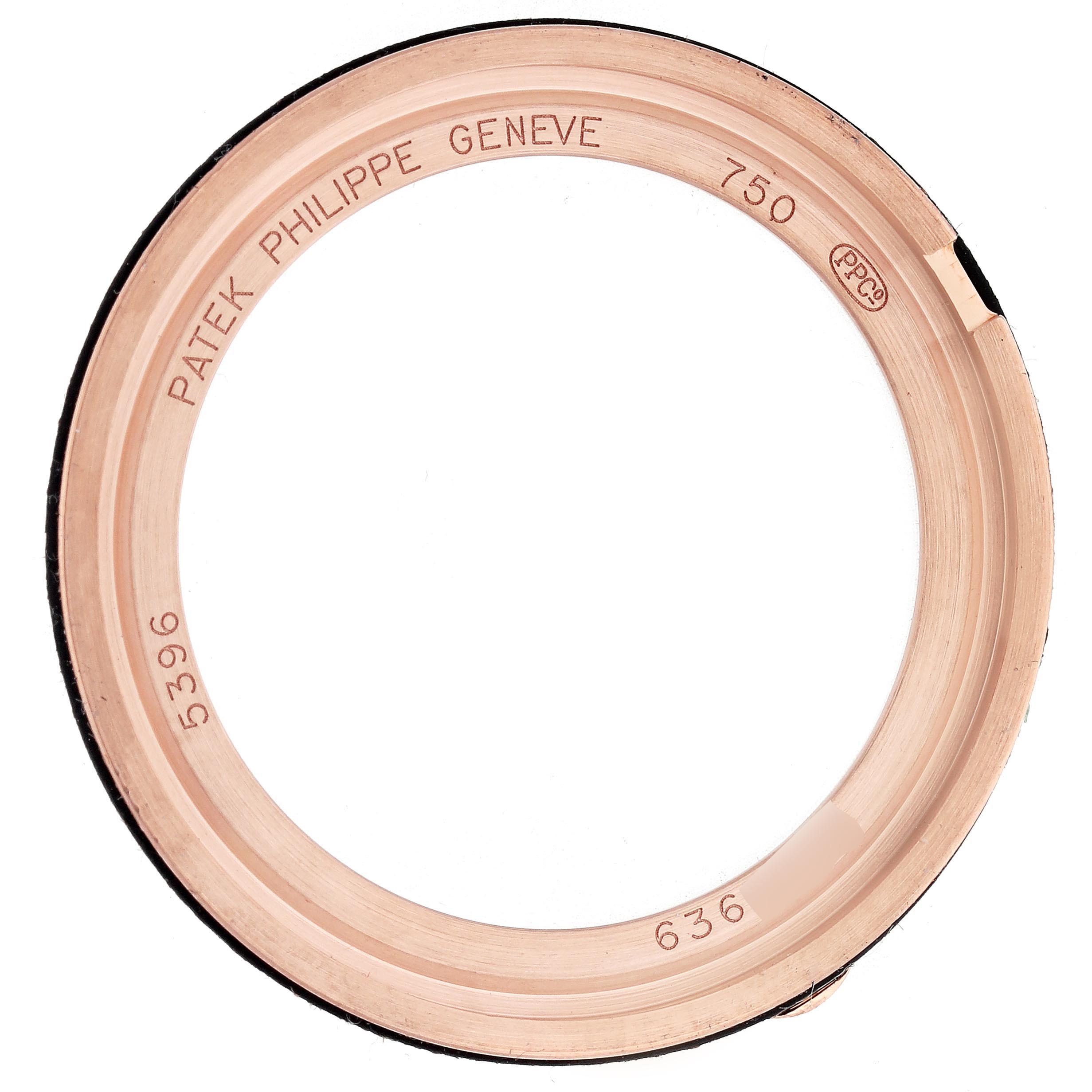 The image shows a rose gold case back ring from a Patek Philippe Complications 5396R-014 Men
s Rose Gold Blue Dial 5396R-014 Men
s Rose Gold Blue Dial model, viewed from above.