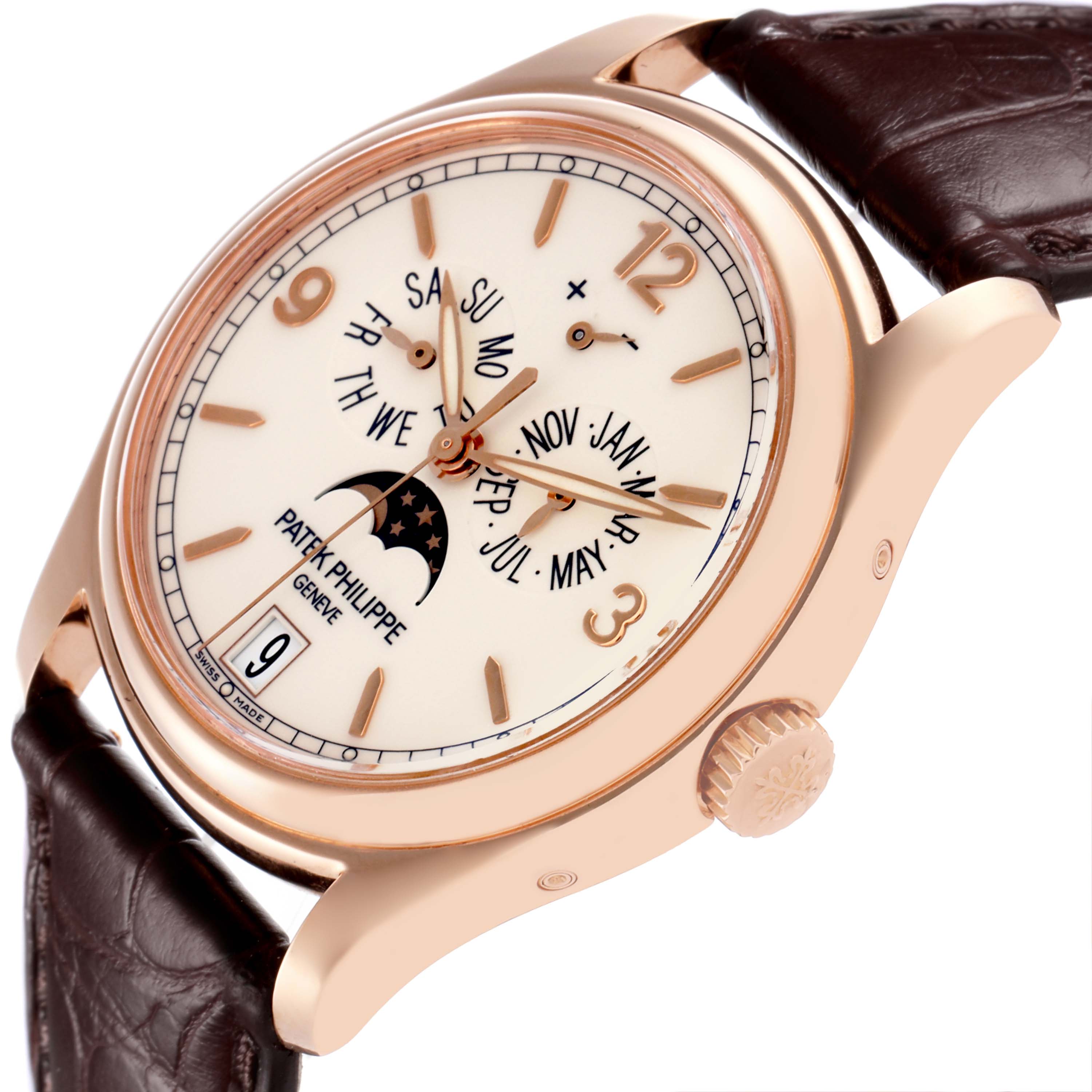 The Patek Philippe Complications 5146R Men's Rose Gold Beige Dial 5146R Men's Rose Gold Beige Dial watch is shown at an angled side view, displaying the dial, crown, and part of the leather strap.