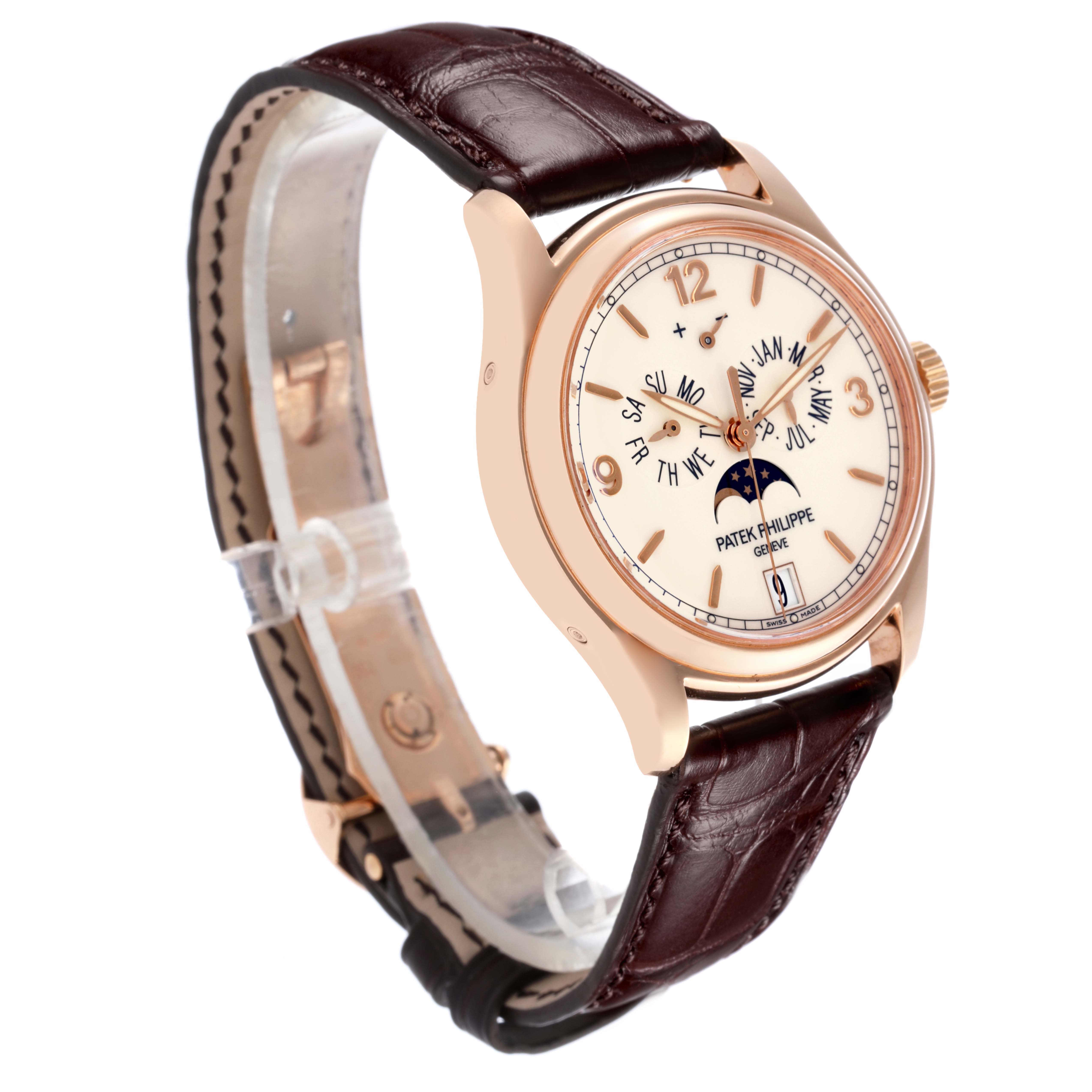 The Patek Philippe Complications 5146R Men's Rose Gold Beige Dial 5146R Men's Rose Gold Beige Dial watch is shown at a three-quarter angle, displaying the face, side, leather strap, and crown.