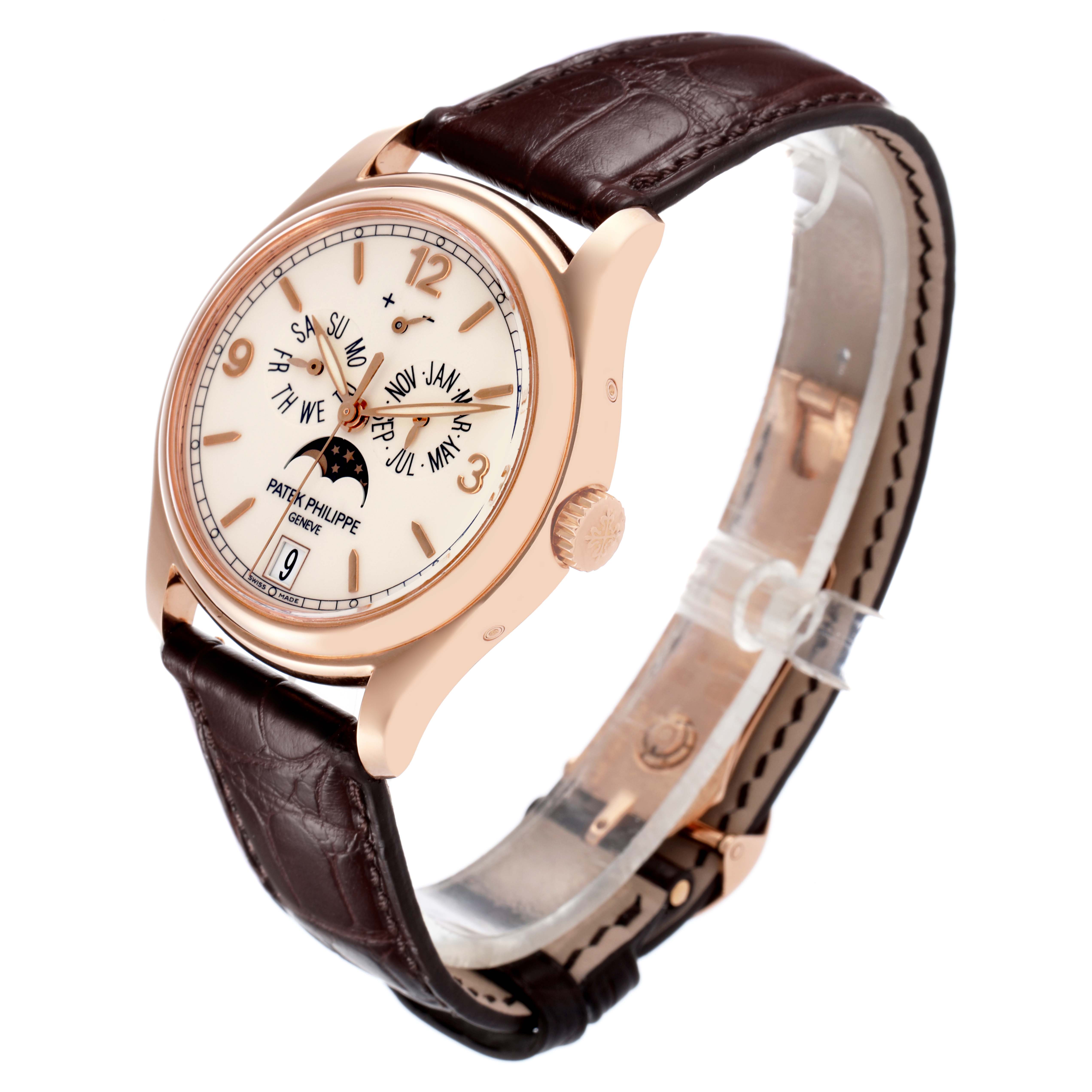 The Patek Philippe Complications 5146R Men's Rose Gold Beige Dial 5146R Men's Rose Gold Beige Dial watch is shown at an oblique angle, highlighting the dial, crown, and leather strap.