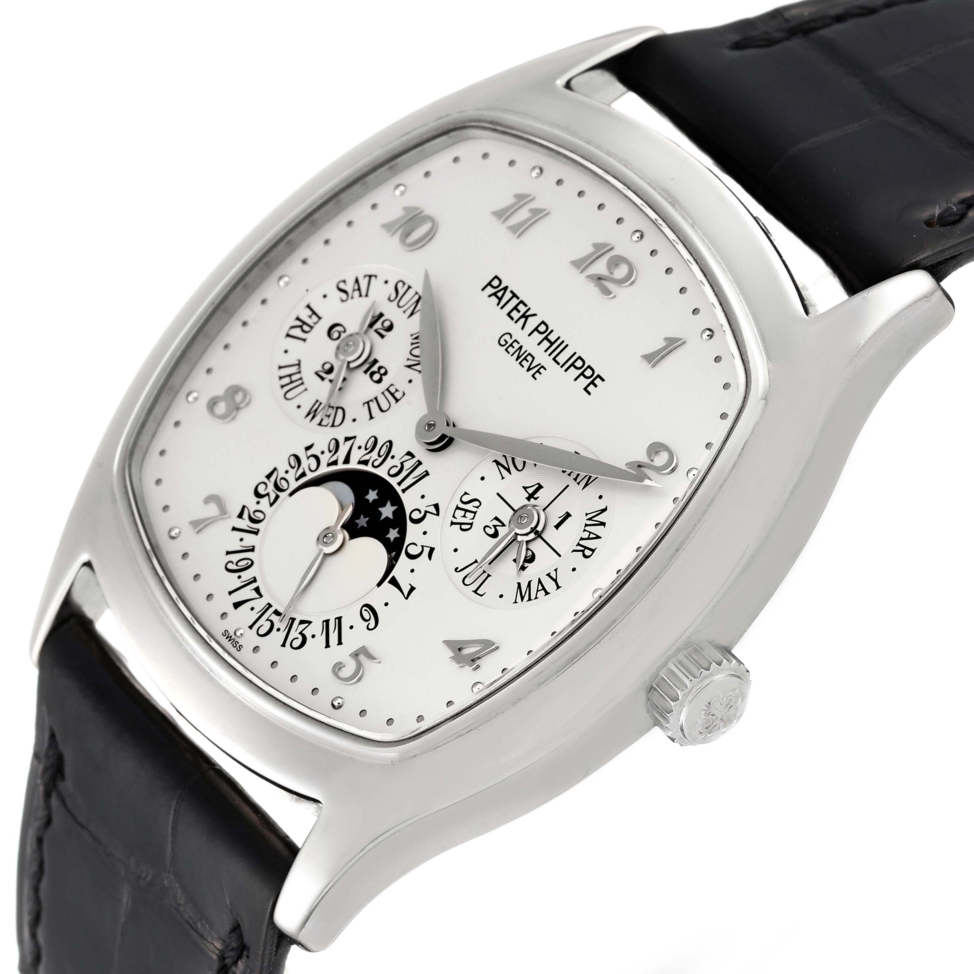 The image shows a close-up angle of the Patek Philippe Complications 5940G - 001 Men
s White Gold Silver Dial 5940G - 001 Men
s White Gold Silver Dial watch, highlighting its white dial, subdials, and black leather strap.