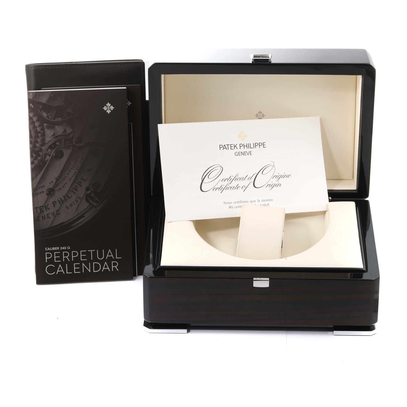 The image shows the box, certificate of origin, and manual for the Patek Philippe Complications 5940G - 001 Men
s White Gold Silver Dial 5940G - 001 Men
s White Gold Silver Dial model watch.