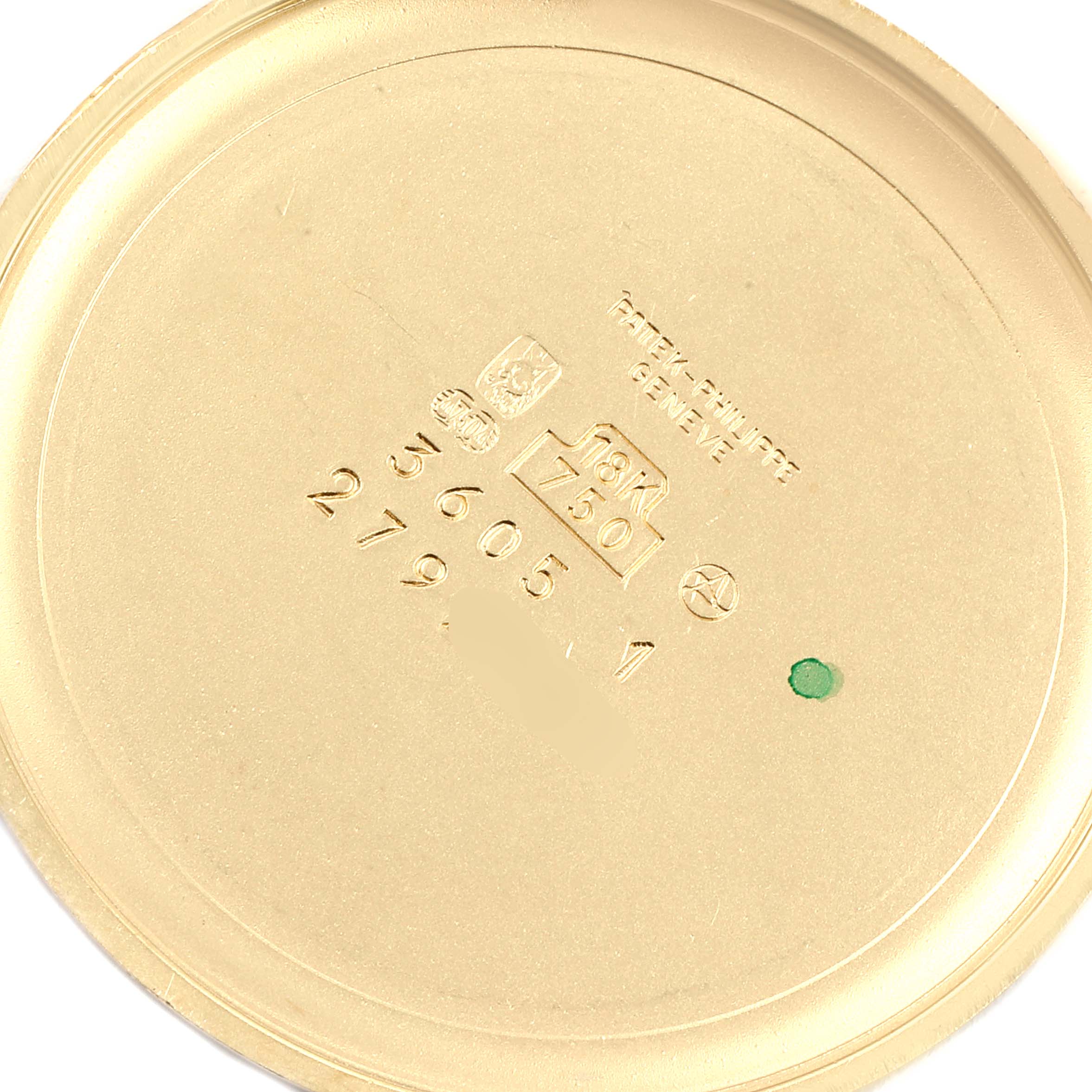 This image shows the inner case back of a Patek Philippe Golden Ellipse 3605 Men
s Yellow Gold Champagne Dial 3605 Men
s Yellow Gold Champagne Dial watch, featuring engravings and hallmarks.