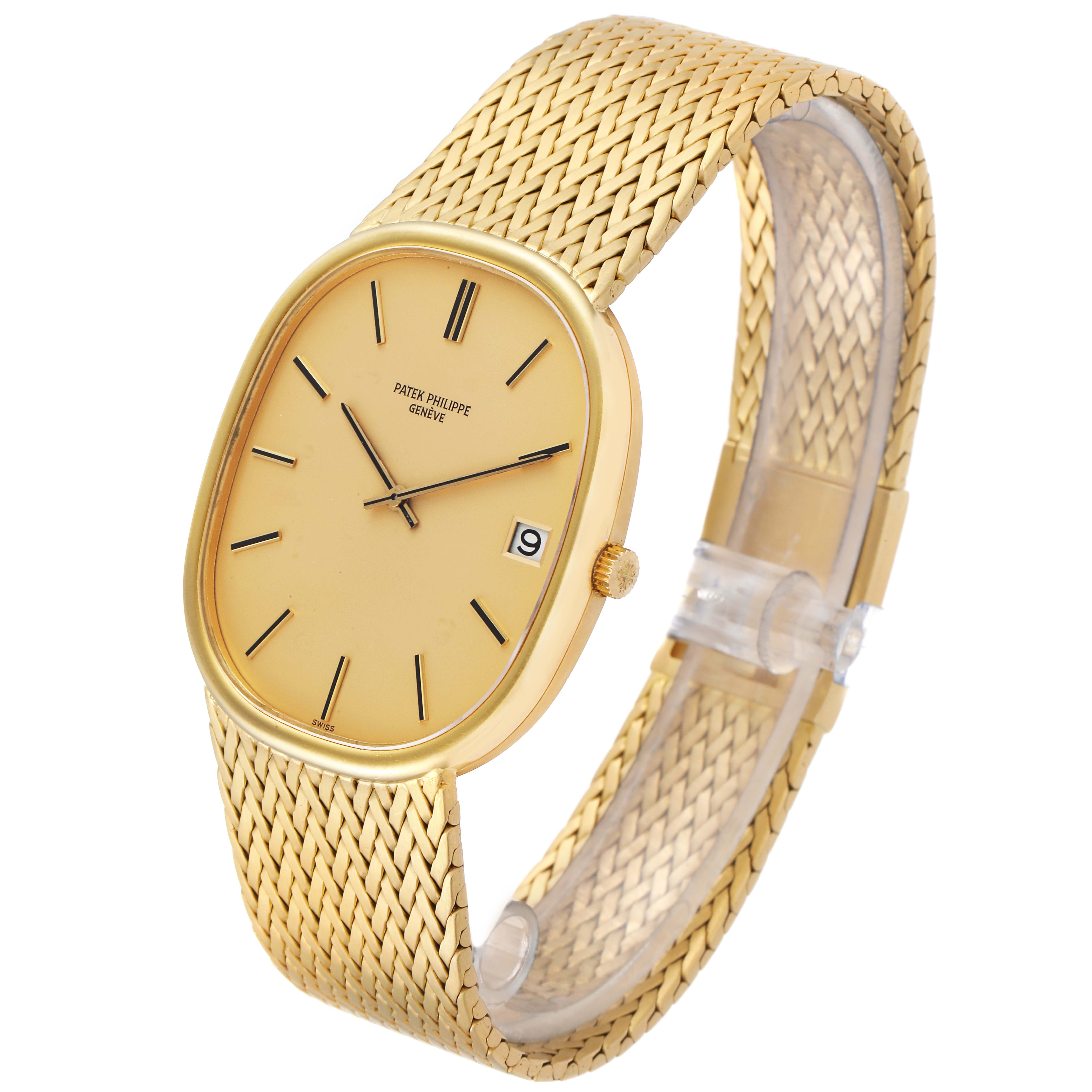 The Patek Philippe Golden Ellipse 3605 Men
s Yellow Gold Champagne Dial 3605 Men
s Yellow Gold Champagne Dial watch is shown at an angled view, highlighting its gold case, dial, crown, and woven bracelet.