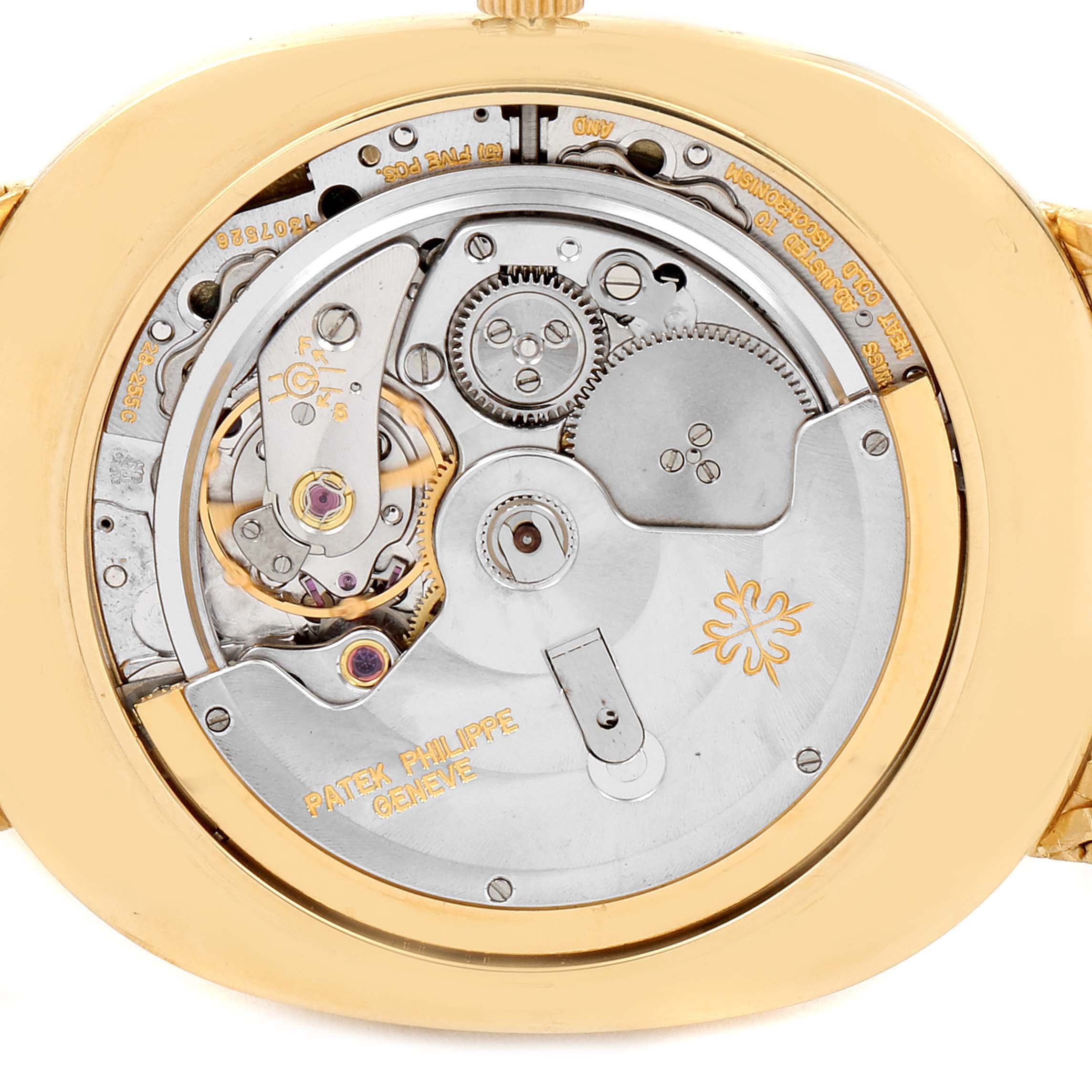 The image shows the back view of the Patek Philippe Golden Ellipse 3605 Men
s Yellow Gold Champagne Dial 3605 Men
s Yellow Gold Champagne Dial watch, highlighting its intricate mechanical movement.