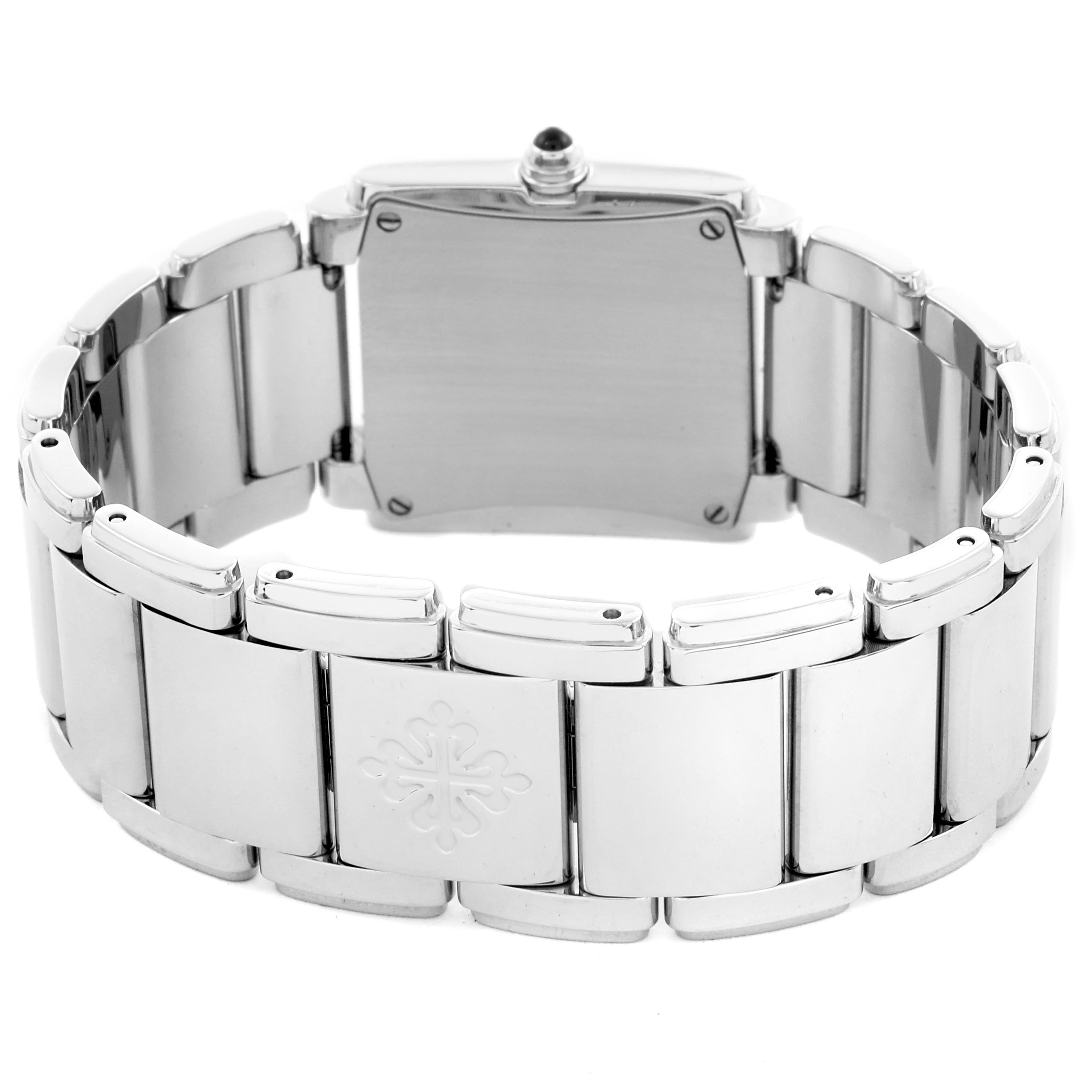 The image shows the back of a Patek Philippe Twenty-4 4910/10A Women's Stainless Steel Silver Dial 4910/10A Women's Stainless Steel Silver Dial, featuring the bracelet and case back.