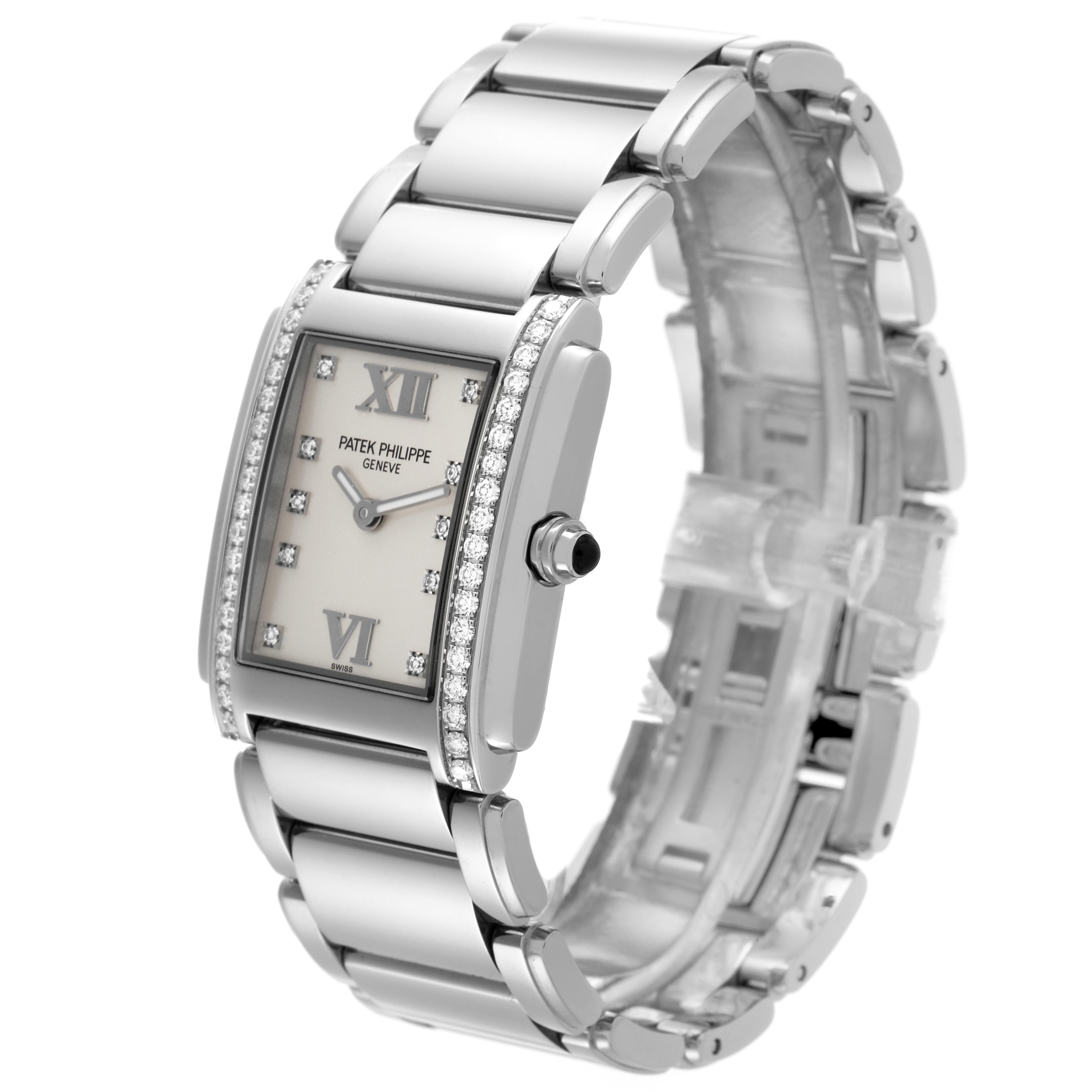 The Patek Philippe Twenty-4 4910/10A Women's Stainless Steel Silver Dial 4910/10A Women's Stainless Steel Silver Dial watch is shown from a three-quarter angle, highlighting its bracelet, case, and diamond accents.