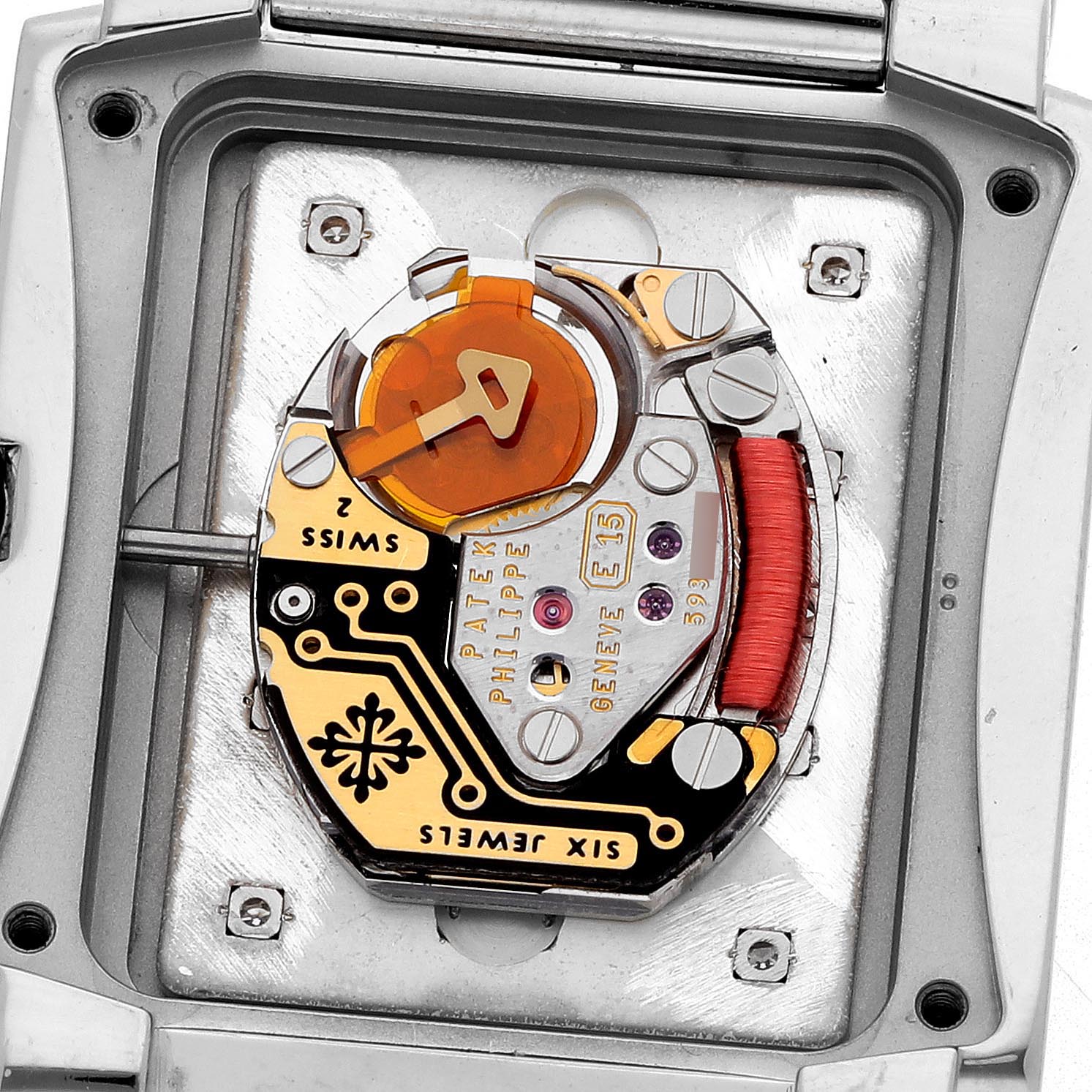 The image shows the movement of the Patek Philippe Twenty-4 4910/10A Women's Stainless Steel Silver Dial 4910/10A Women's Stainless Steel Silver Dial model from a rear angle, highlighting its intricate components.