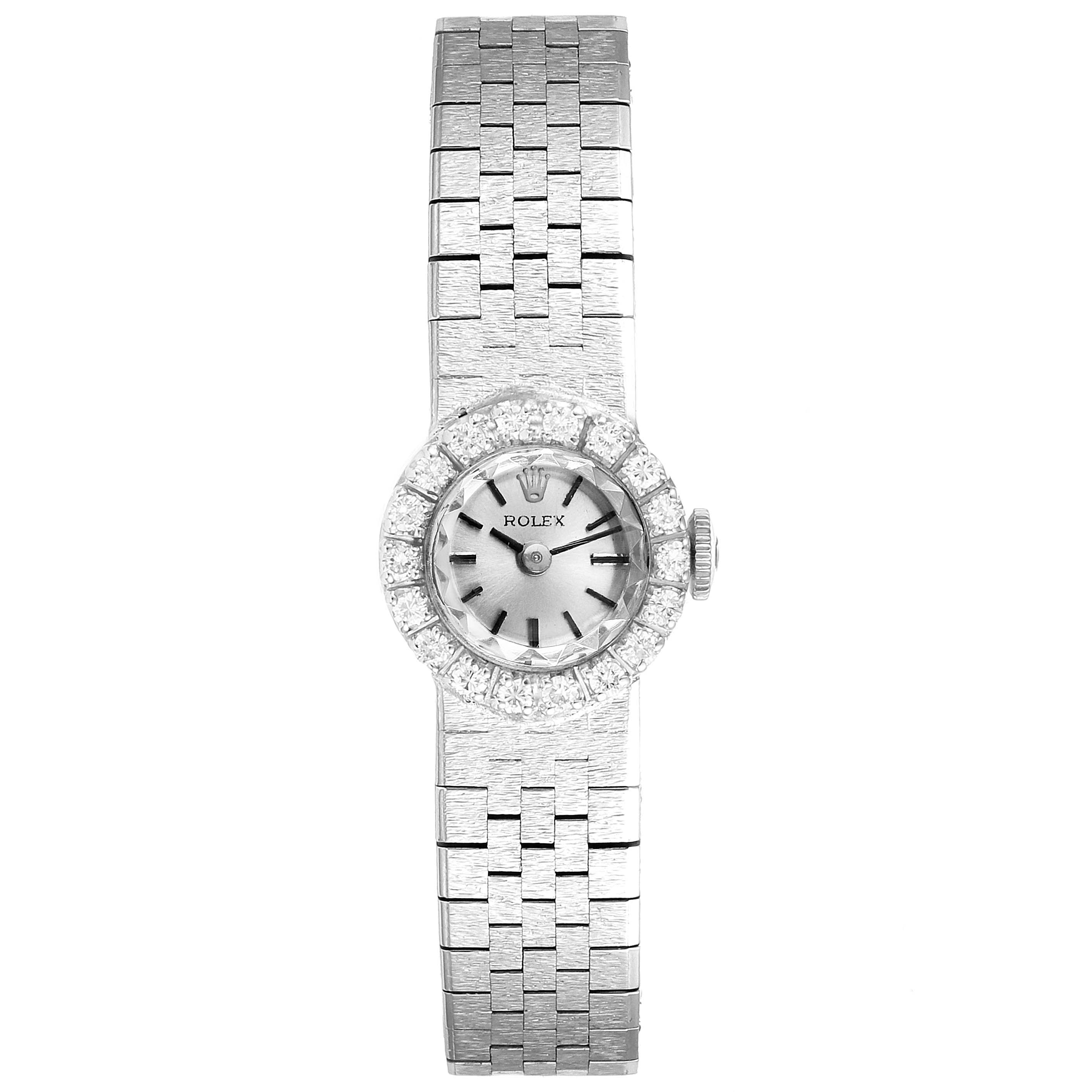 This image shows a Rolex Cocktail 4431 Women's White Gold Silver Dial 4431 Women's White Gold Silver Dial model watch from a top-down angle, displaying its face, bezel, and bracelet.