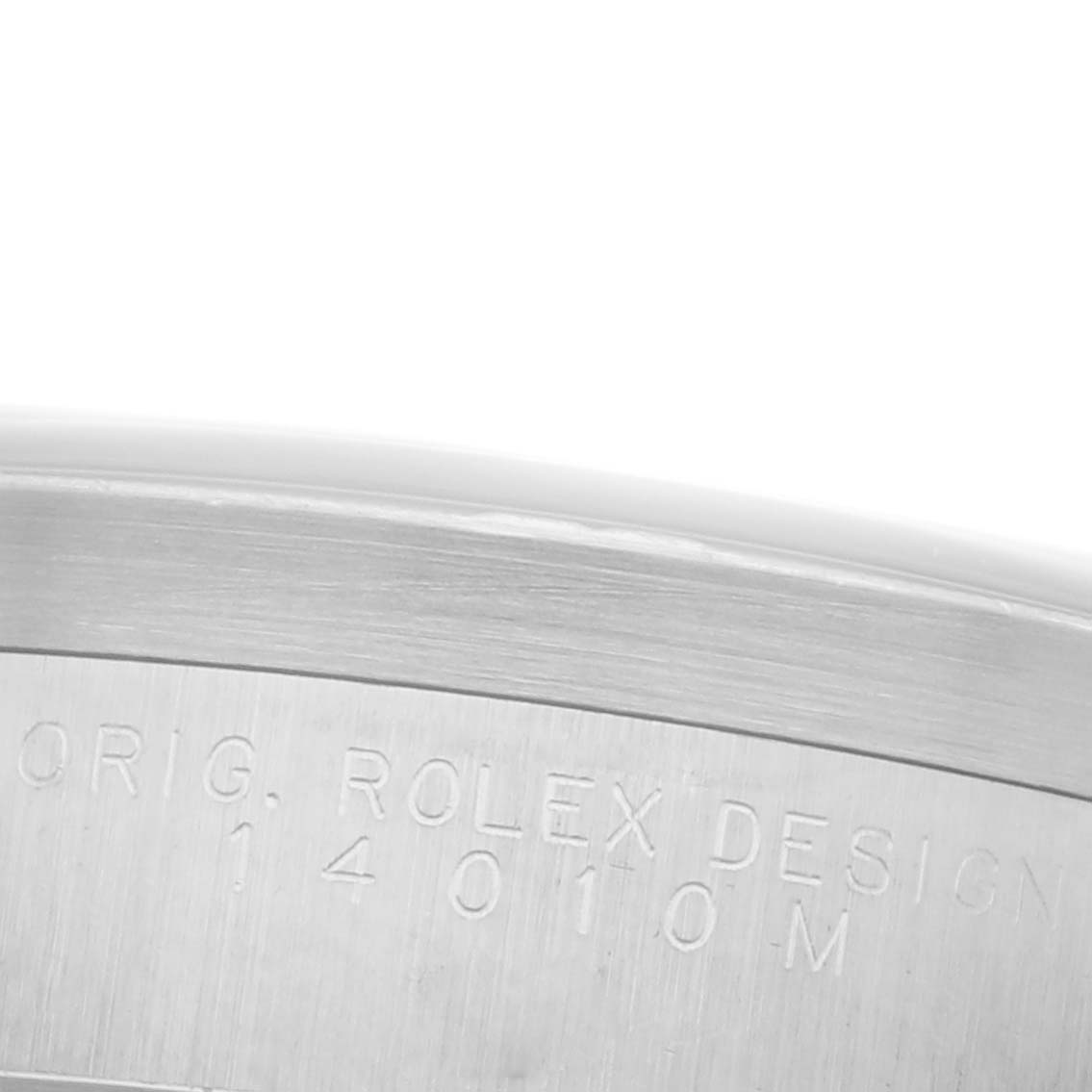 The image shows the side engraving of the Rolex Air-King 14010M Men's Stainless Steel Black Dial 14010M Men's Stainless Steel Black Dial watch case with a partial reference number.