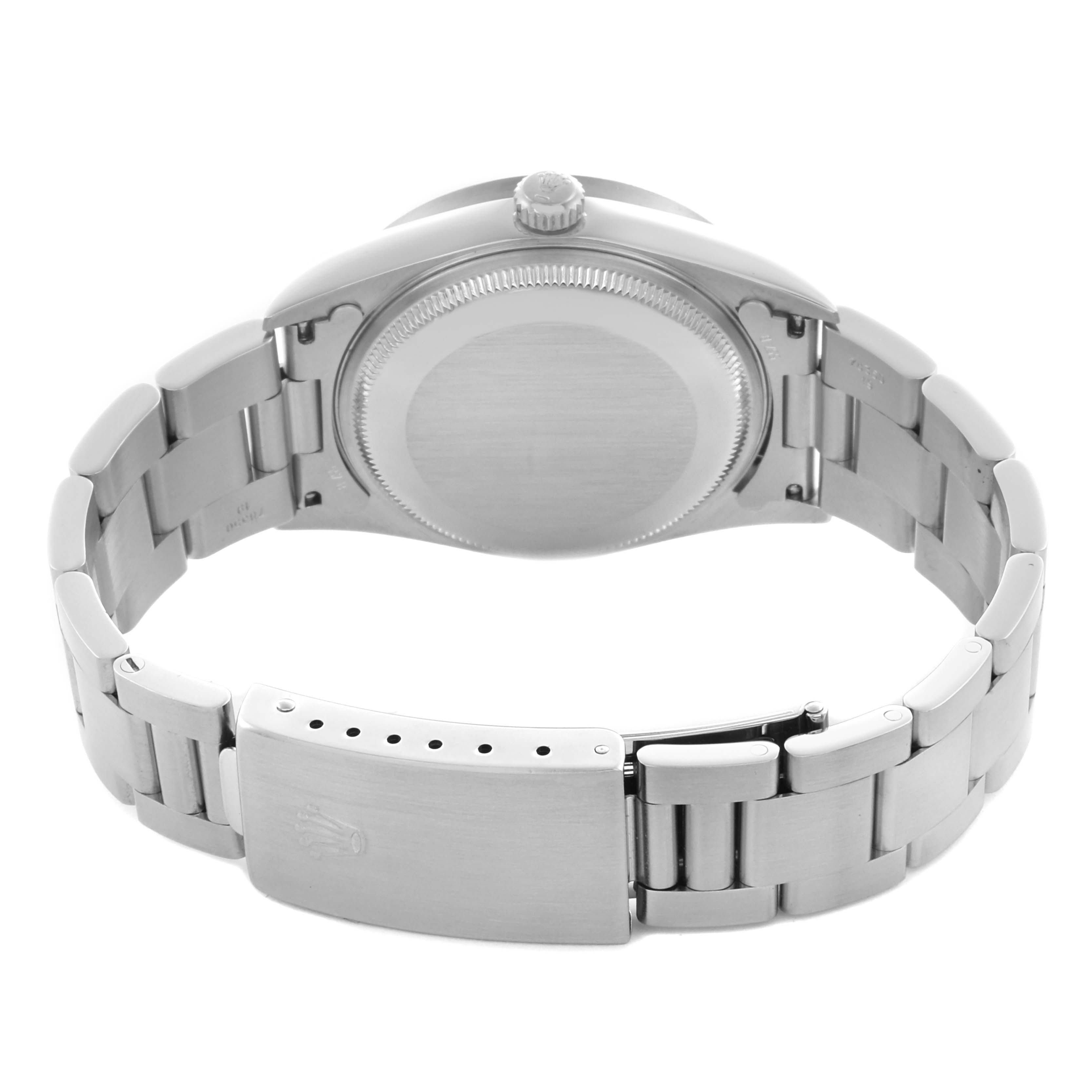 The image shows the underside of the Rolex Air-King 14010M Men's Stainless Steel Black Dial 14010M Men's Stainless Steel Black Dial, highlighting the case back, crown, and metal bracelet with its clasp.