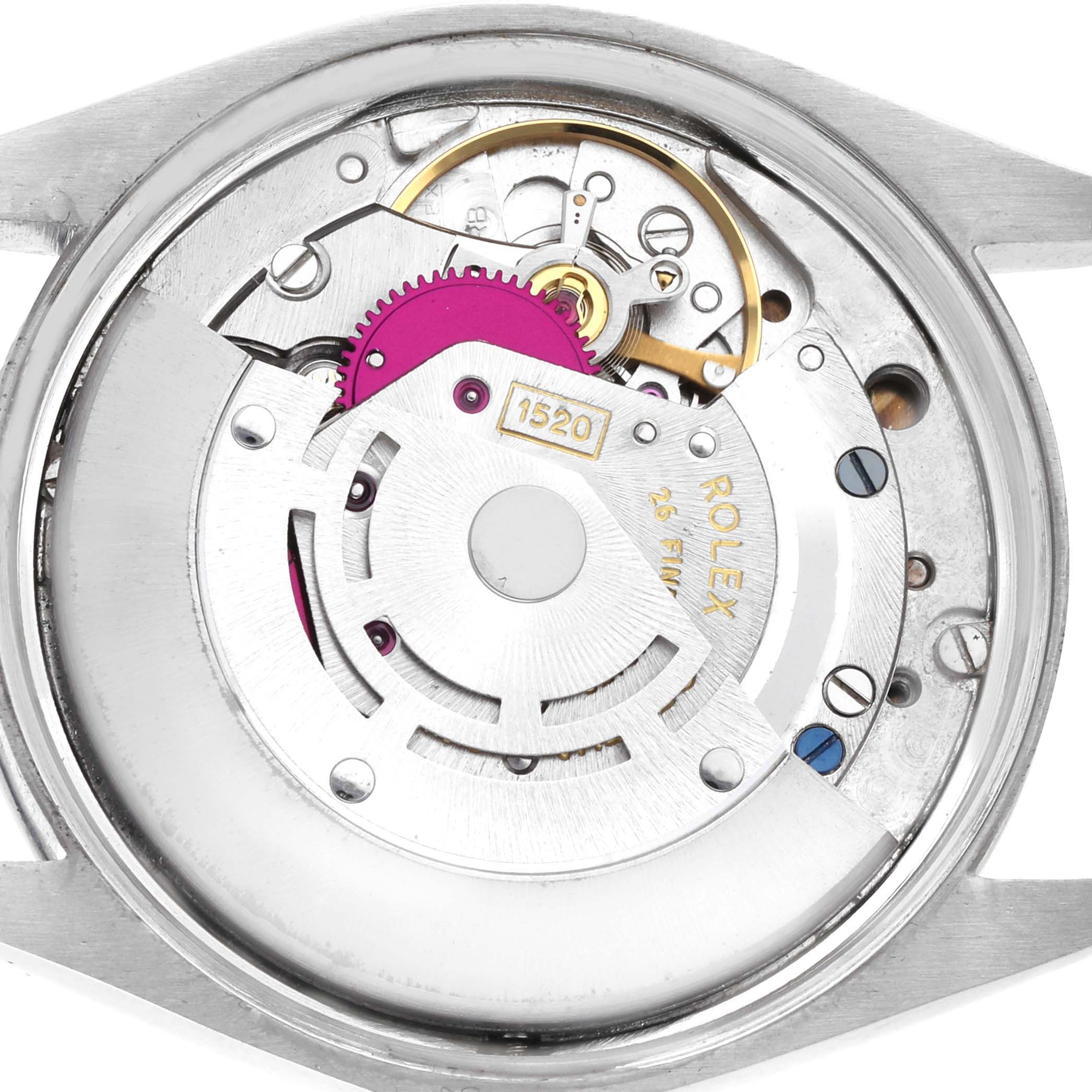 The image shows the movement of a Rolex Air-King 5500 Men's Stainless Steel Silver Dial 5500 Men's Stainless Steel Silver Dial watch, featuring gears and components from a top-down view.